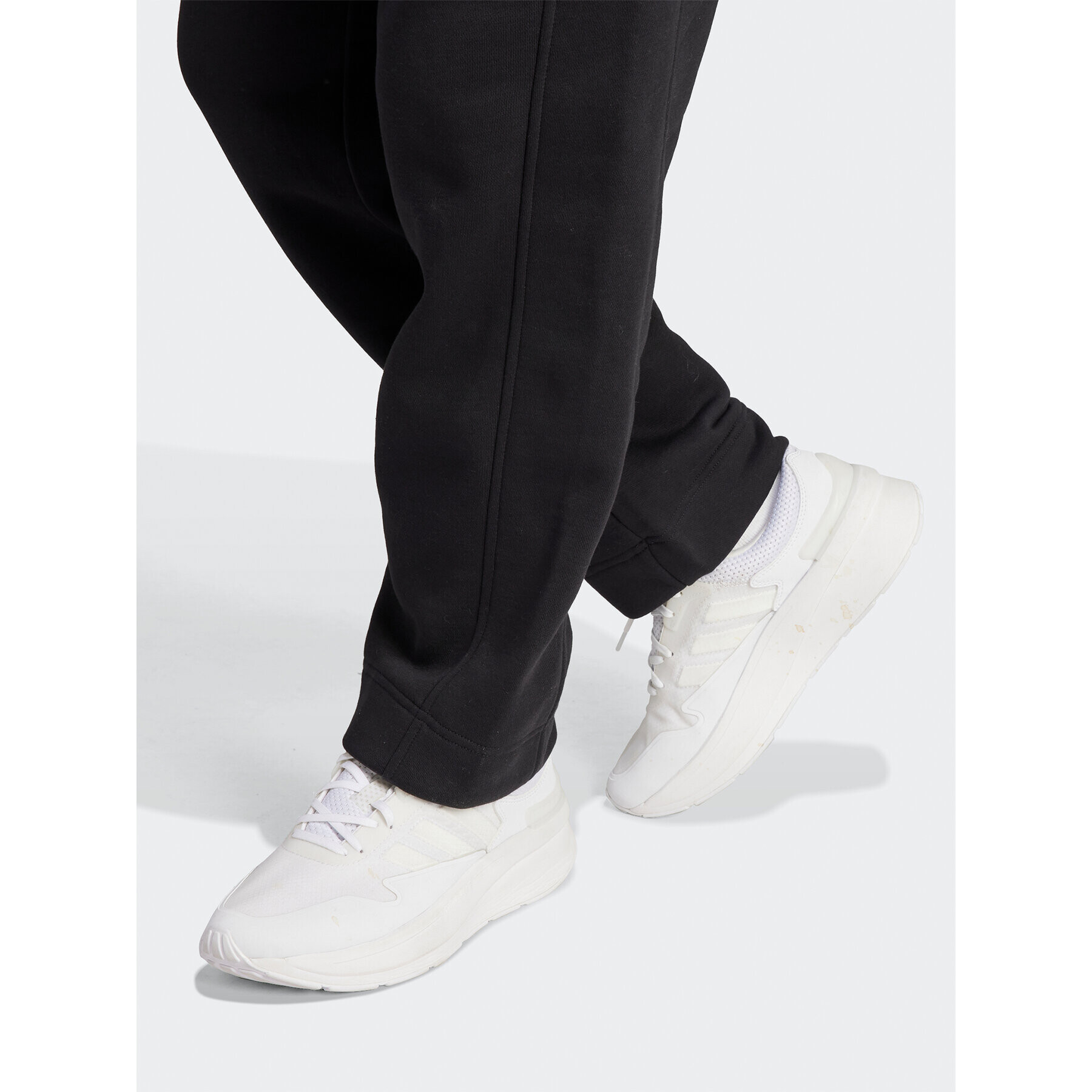 adidas Pantaloni trening All SZN Fleece Graphic HZ5802 Negru Loose Fit - Pled.ro