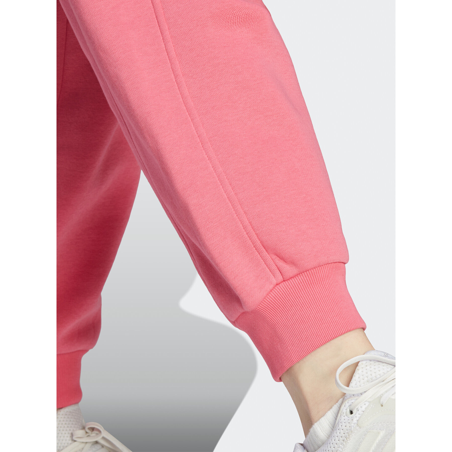 adidas Pantaloni trening ALL SZN Fleece IM0334 Roz Loose Fit - Pled.ro