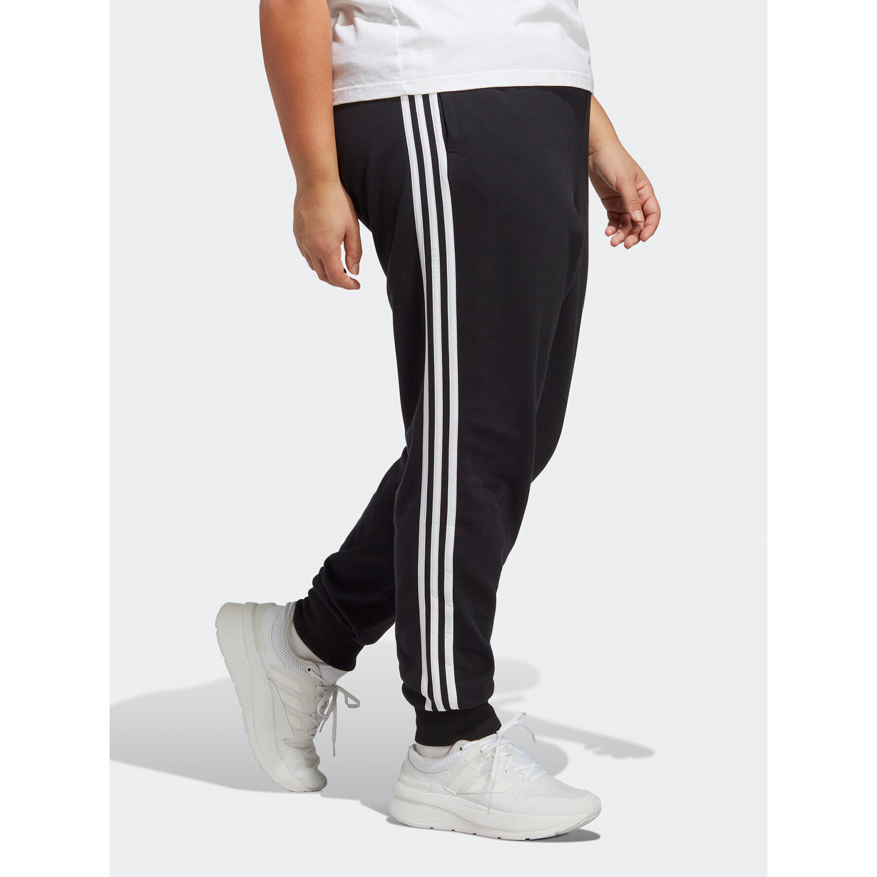 adidas Pantaloni trening Essentials 3-Stripes French Terry Cuffed Joggers (Plus Size) IB8745 Negru Slim Fit - Pled.ro