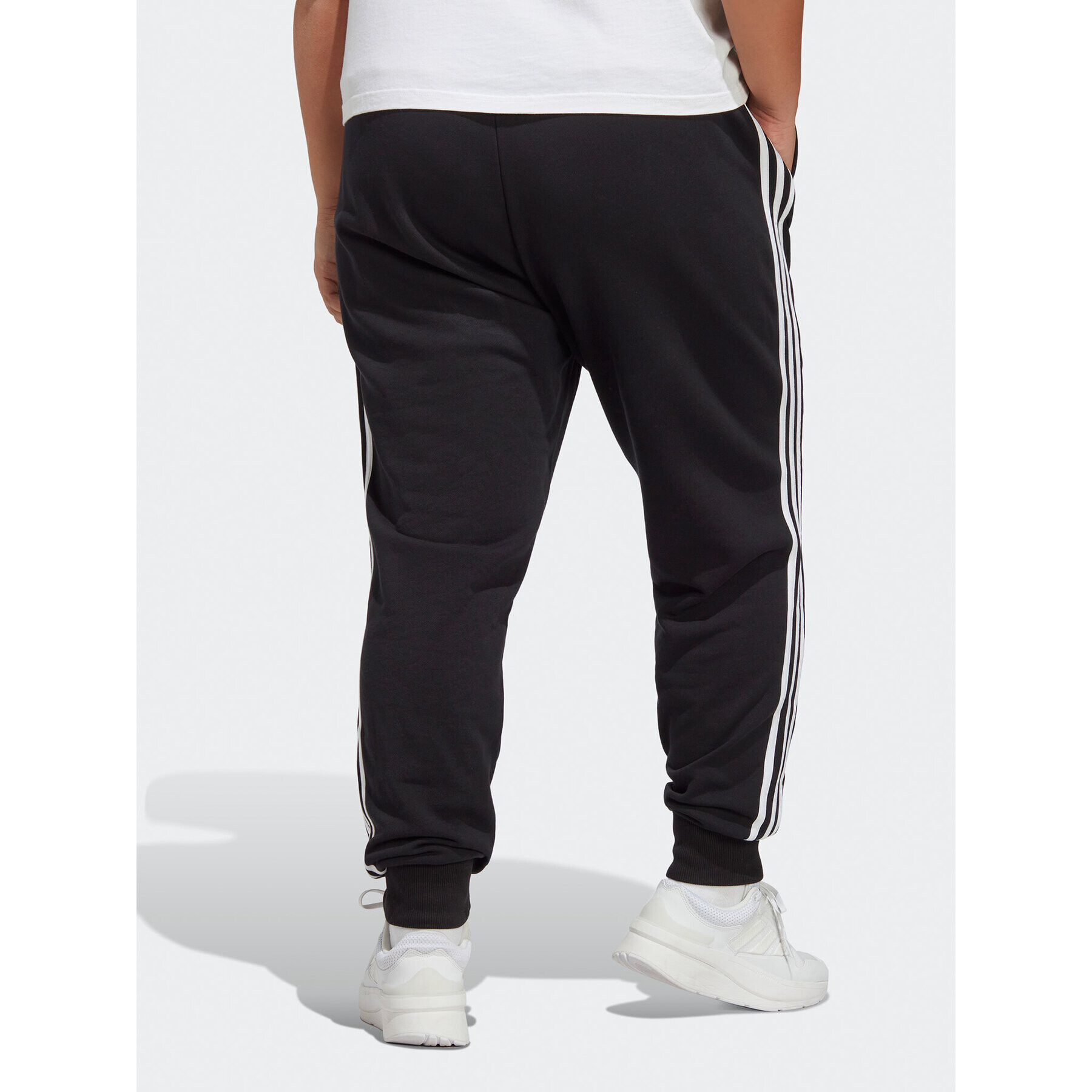 adidas Pantaloni trening Essentials 3-Stripes French Terry Cuffed Joggers (Plus Size) IB8745 Negru Slim Fit - Pled.ro