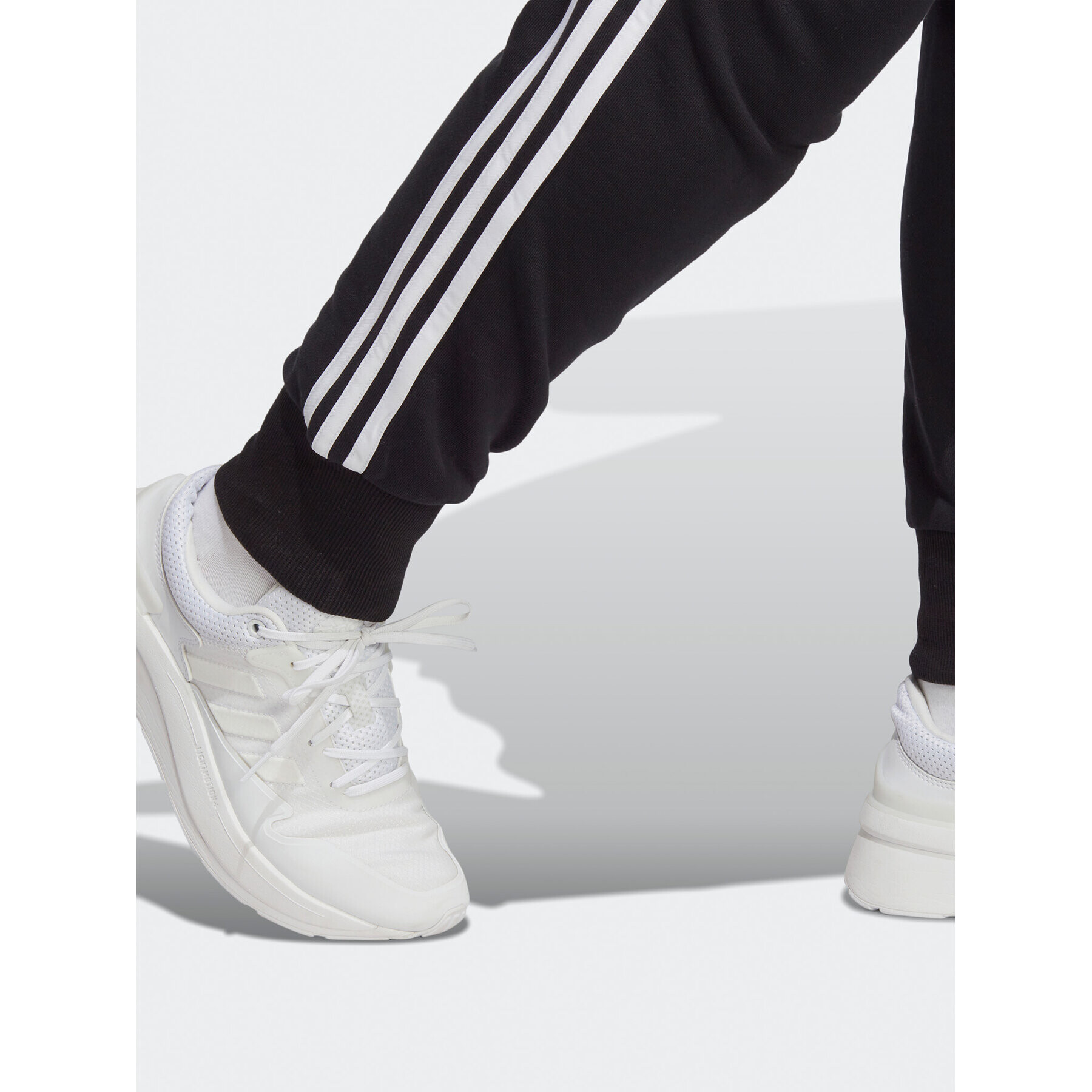 adidas Pantaloni trening Essentials 3-Stripes French Terry Cuffed Joggers (Plus Size) IB8745 Negru Slim Fit - Pled.ro