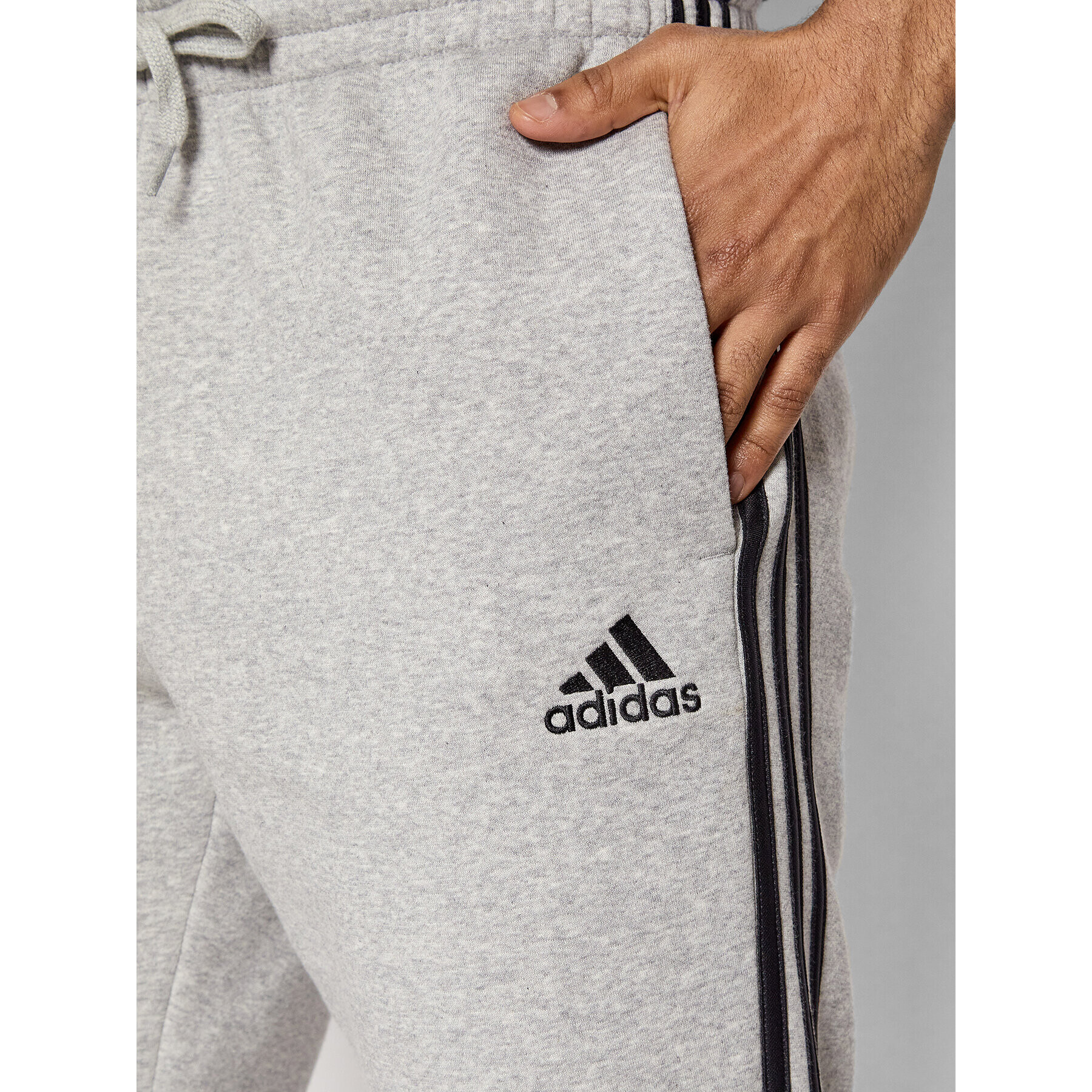 adidas Pantaloni trening Essentials 3-Stripes GM1091 Gri Slim Fit - Pled.ro