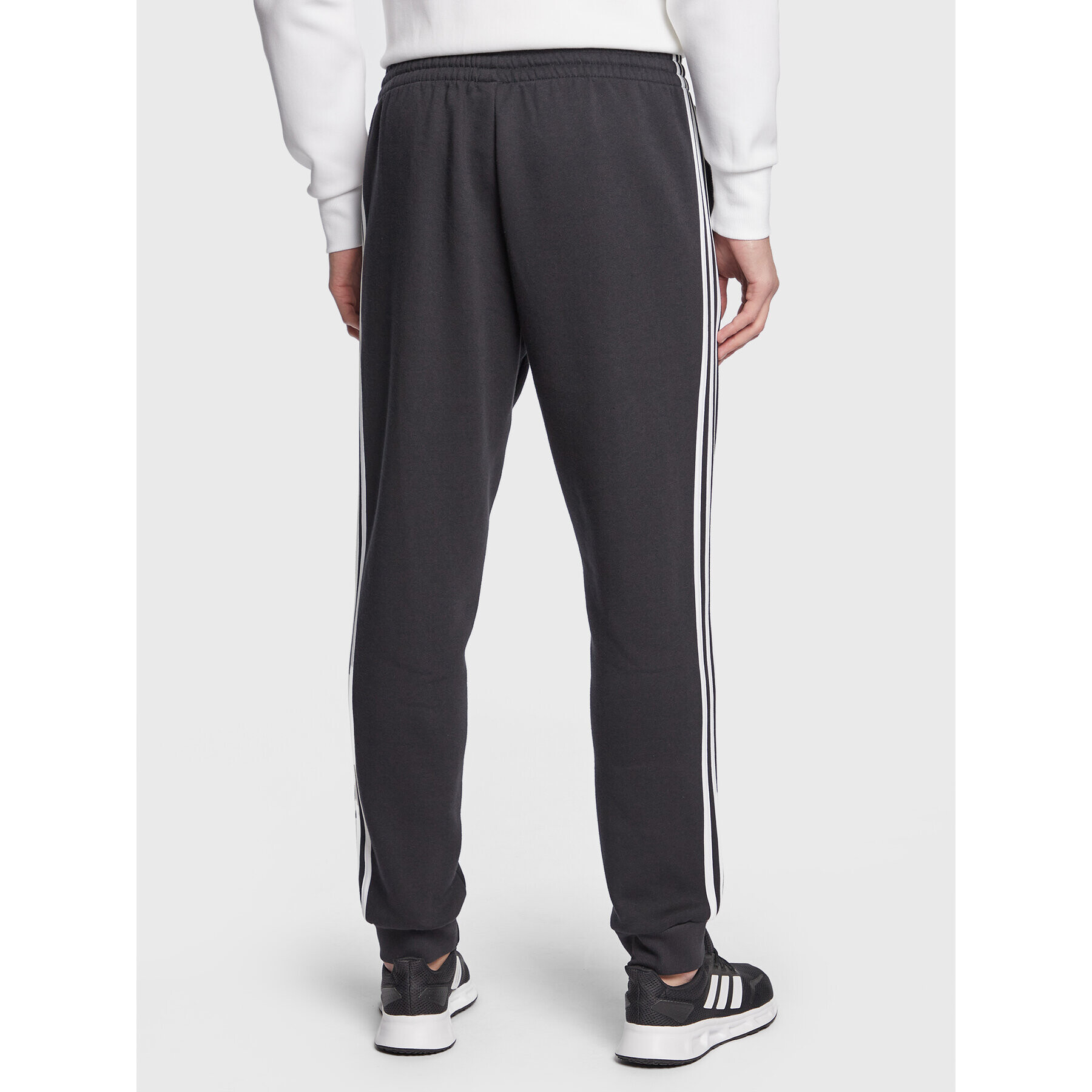 adidas Pantaloni trening Essentials Fleece GK8821 Negru Regular Fit - Pled.ro