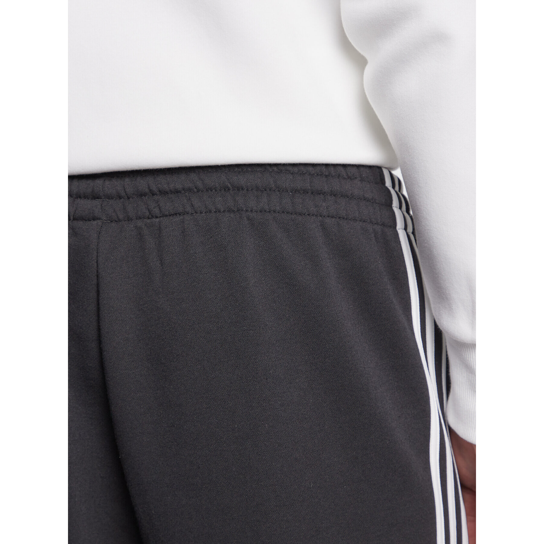 adidas Pantaloni trening Essentials Fleece GK8821 Negru Regular Fit - Pled.ro