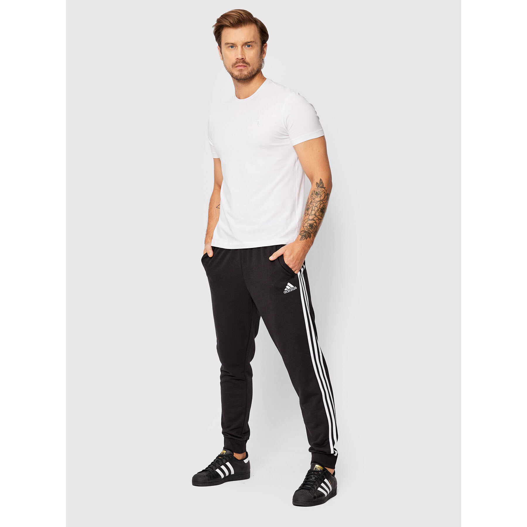 adidas Pantaloni trening Essentials French Terry GK8831 Negru Regular Fit - Pled.ro