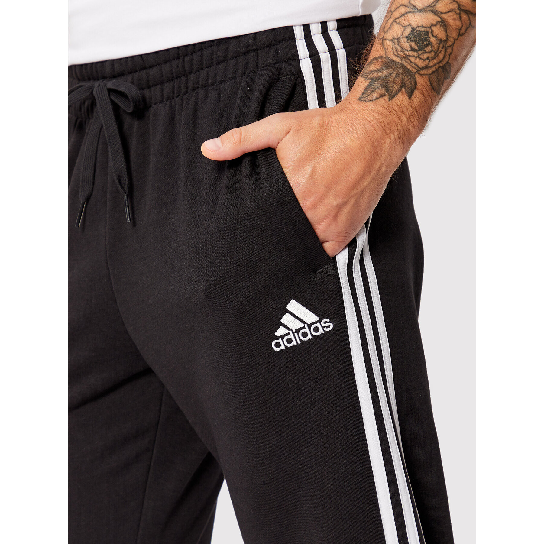 adidas Pantaloni trening Essentials French Terry GK8831 Negru Regular Fit - Pled.ro