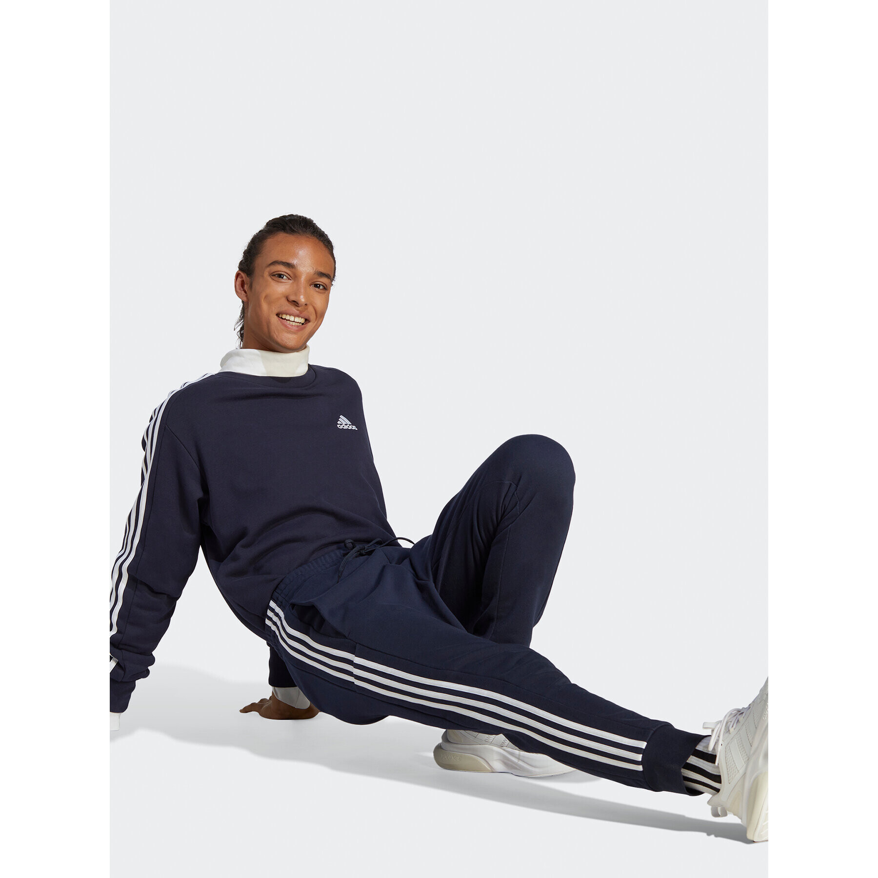 adidas Pantaloni trening Essentials French Terry Tapered Cuff 3-Stripes Joggers IC9406 Albastru Regular Fit - Pled.ro