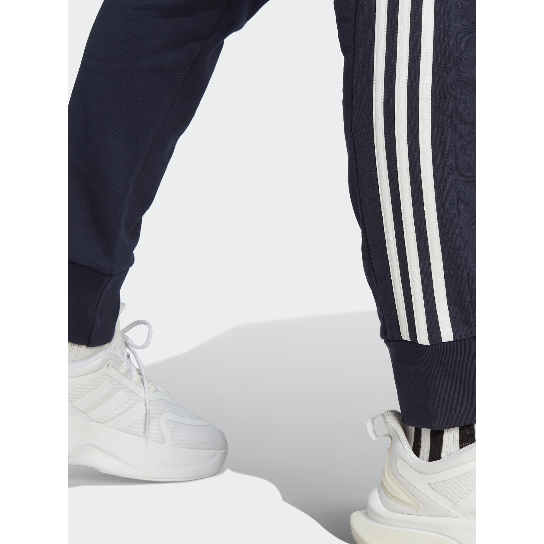 adidas Pantaloni trening Essentials French Terry Tapered Cuff 3-Stripes Joggers IC9406 Albastru Regular Fit - Pled.ro