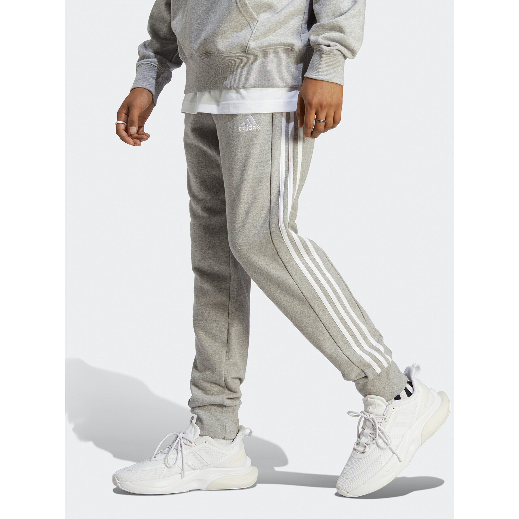 adidas Pantaloni trening Essentials French Terry Tapered Cuff 3-Stripes Joggers IC9407 Gri Regular Fit - Pled.ro