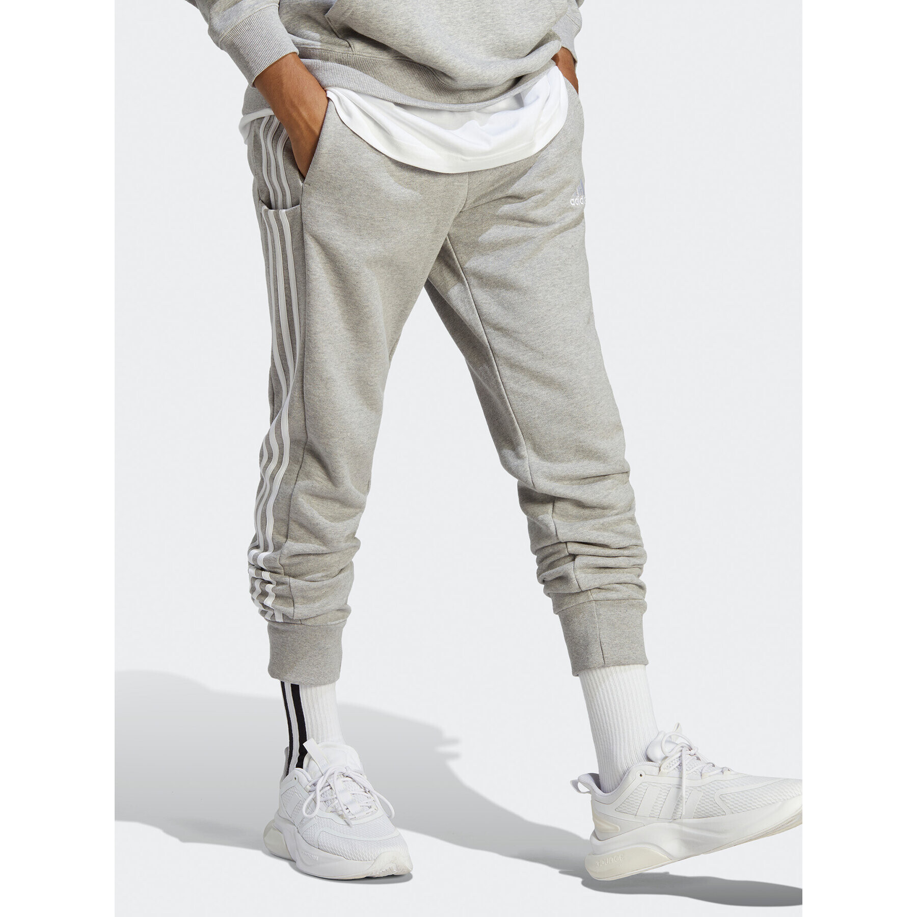 adidas Pantaloni trening Essentials French Terry Tapered Cuff 3-Stripes Joggers IC9407 Gri Regular Fit - Pled.ro