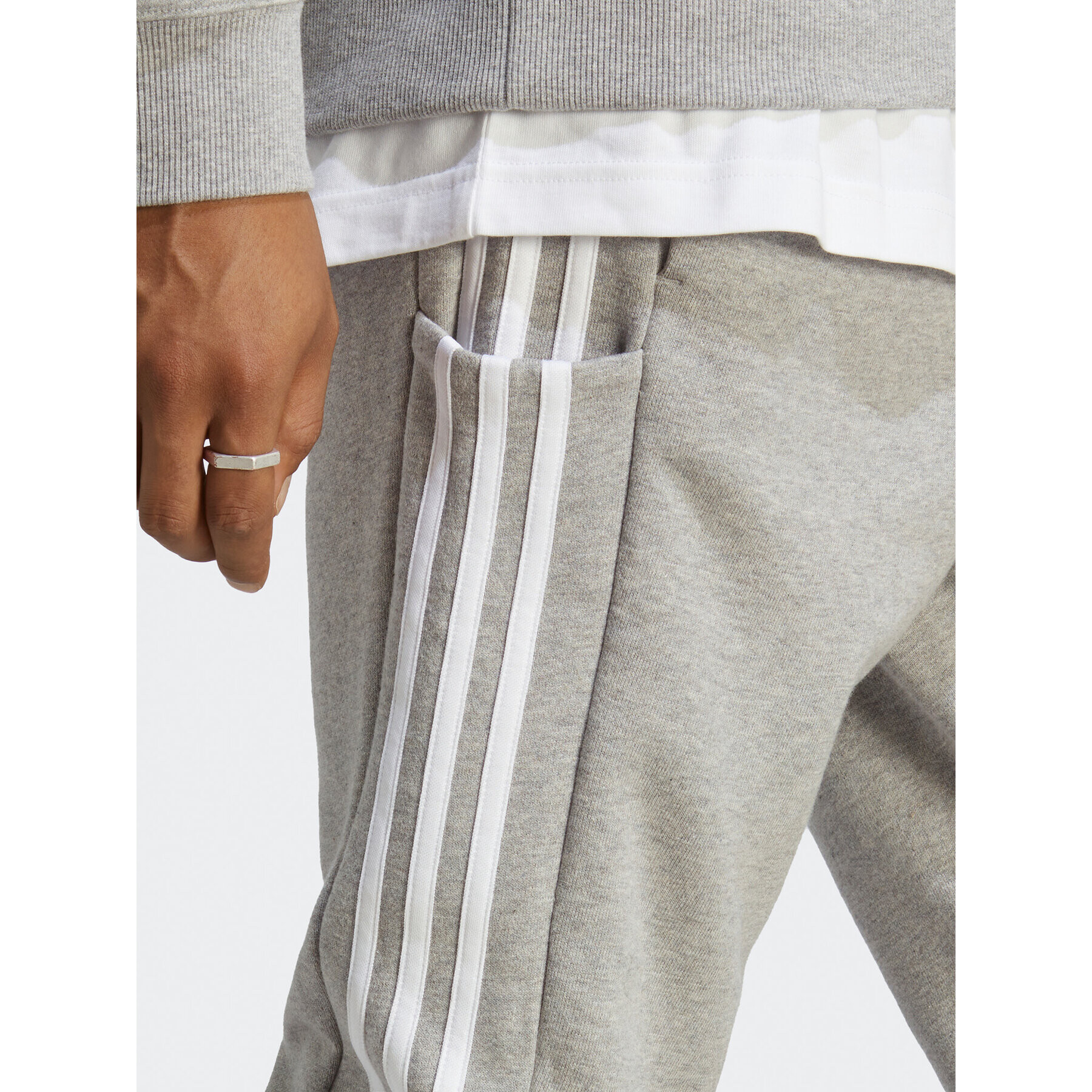 adidas Pantaloni trening Essentials French Terry Tapered Cuff 3-Stripes Joggers IC9407 Gri Regular Fit - Pled.ro