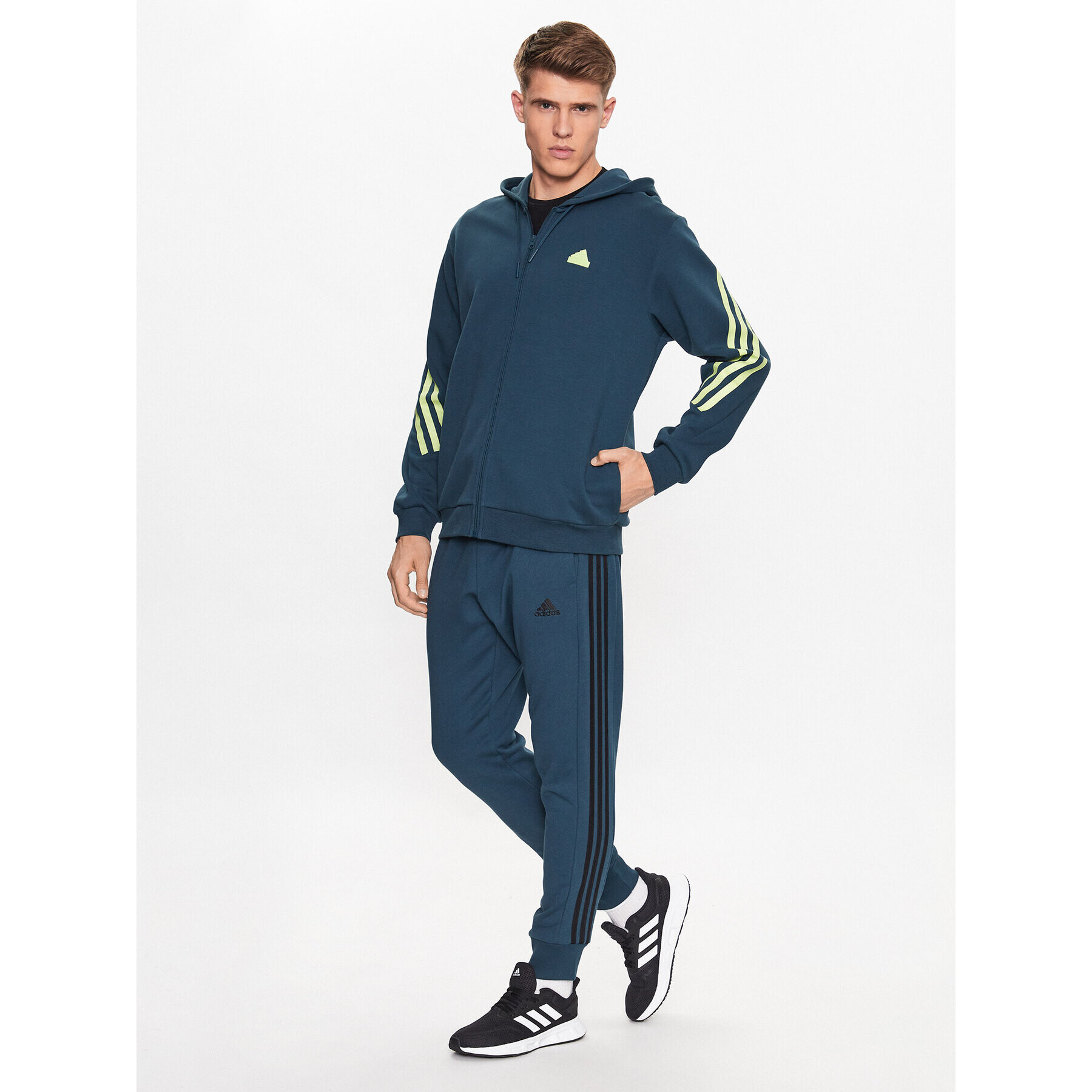 adidas Pantaloni trening Essentials French Terry Tapered Cuff 3-Stripes Joggers IJ8698 Turcoaz Regular Fit - Pled.ro