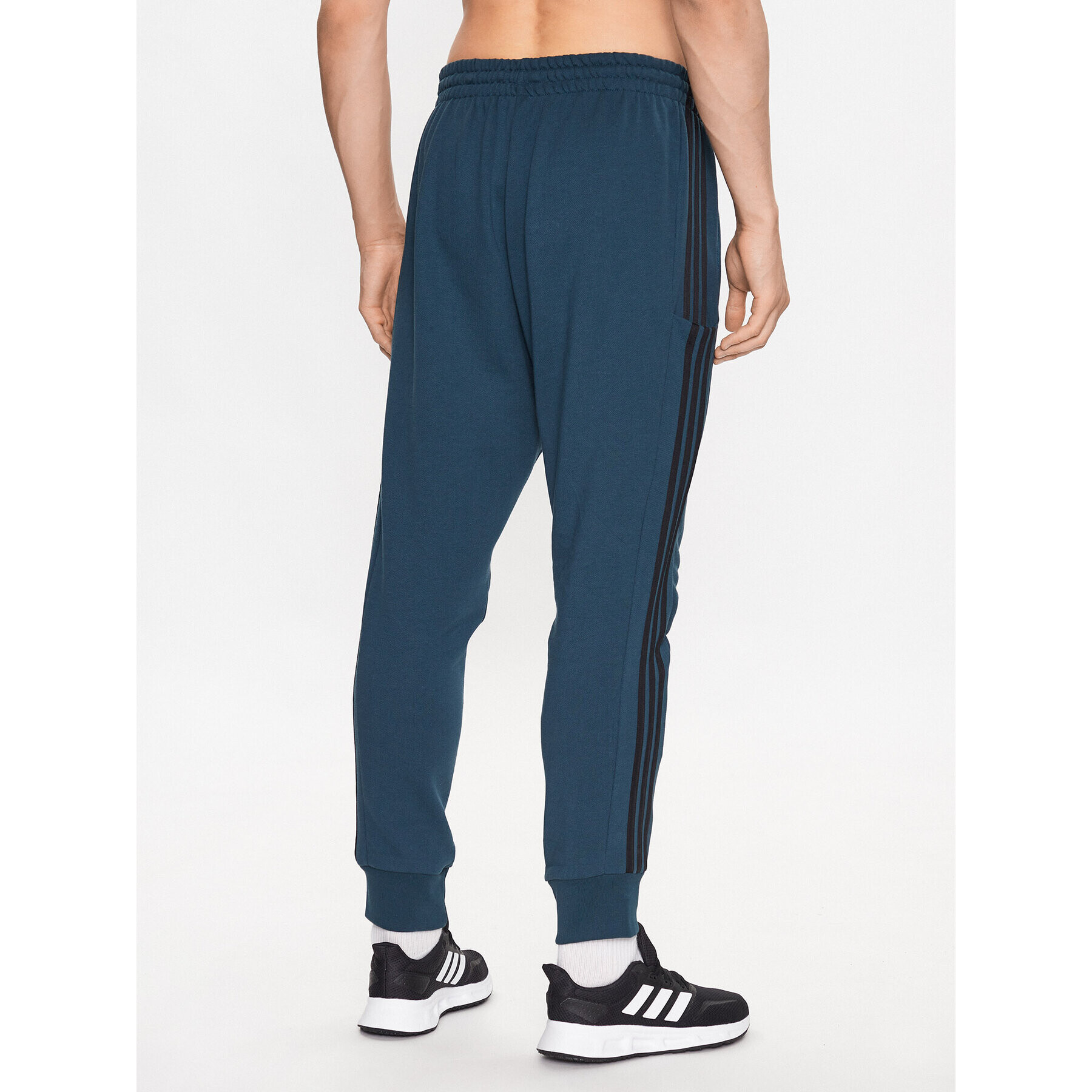 adidas Pantaloni trening Essentials French Terry Tapered Cuff 3-Stripes Joggers IJ8698 Turcoaz Regular Fit - Pled.ro