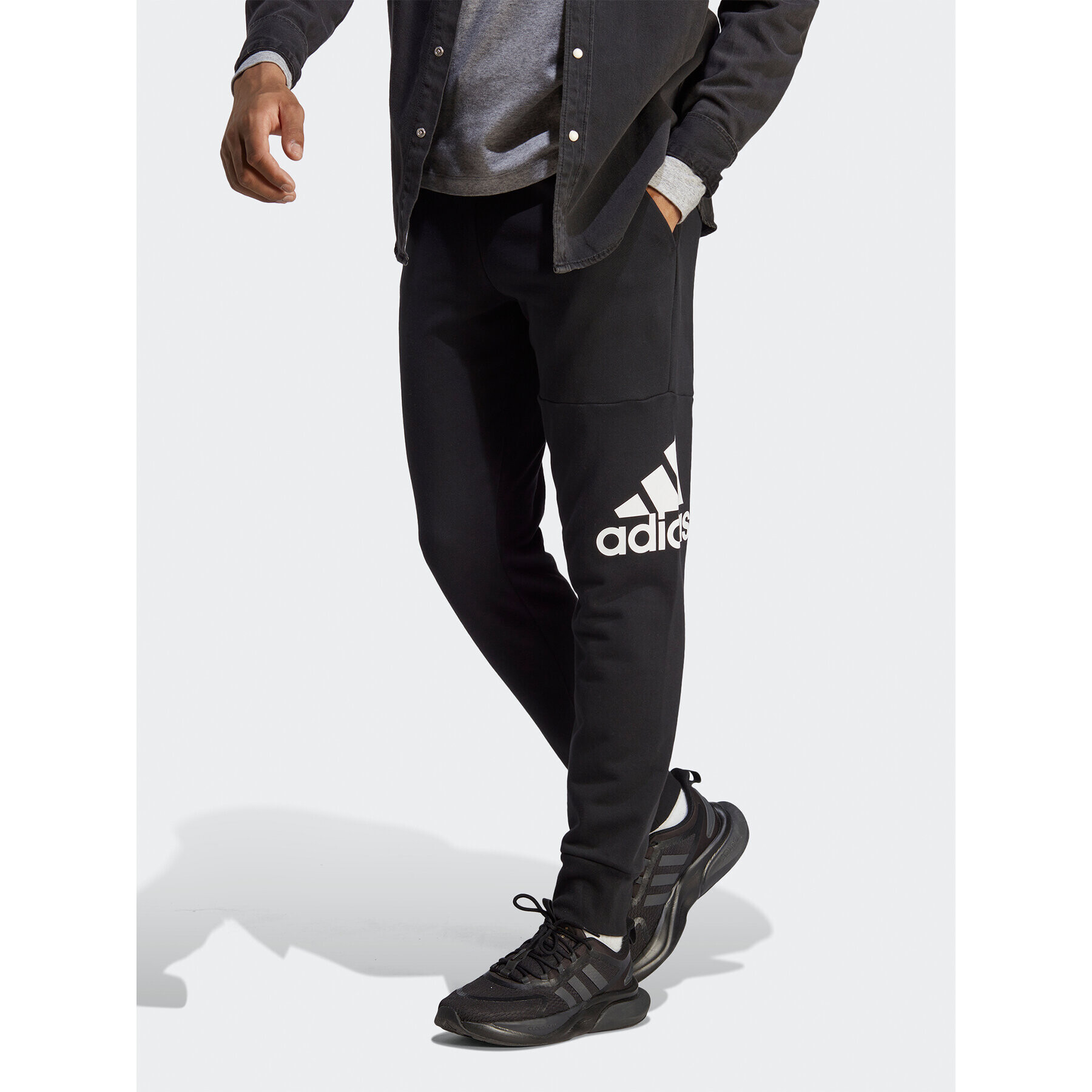 adidas Pantaloni trening Essentials French Terry Tapered Cuff Logo Joggers HA4342 Negru Regular Fit - Pled.ro