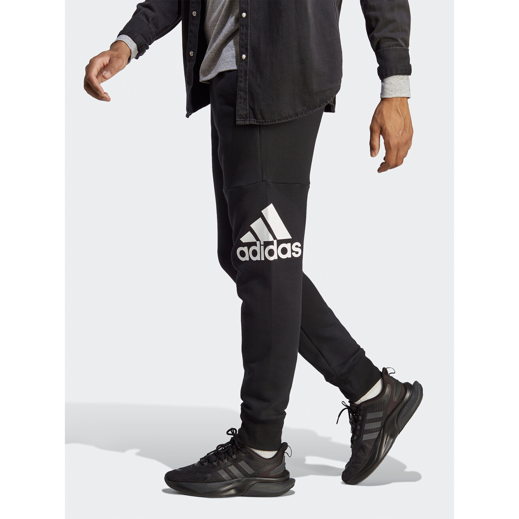 adidas Pantaloni trening Essentials French Terry Tapered Cuff Logo Joggers HA4342 Negru Regular Fit - Pled.ro