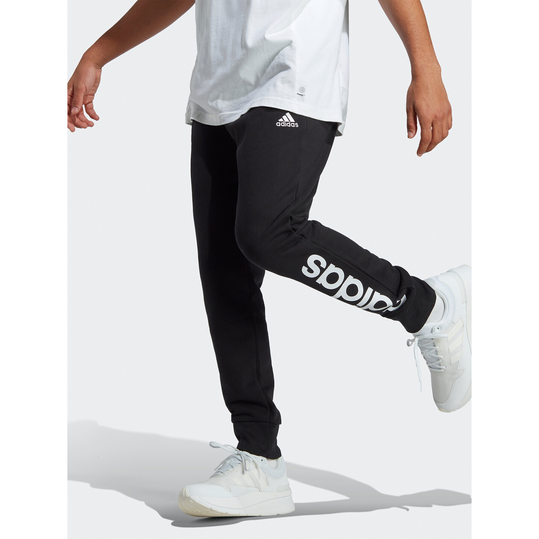 adidas Pantaloni trening Essentials French Terry Tapered Cuff Logo Joggers IC0063 Negru Regular Fit - Pled.ro