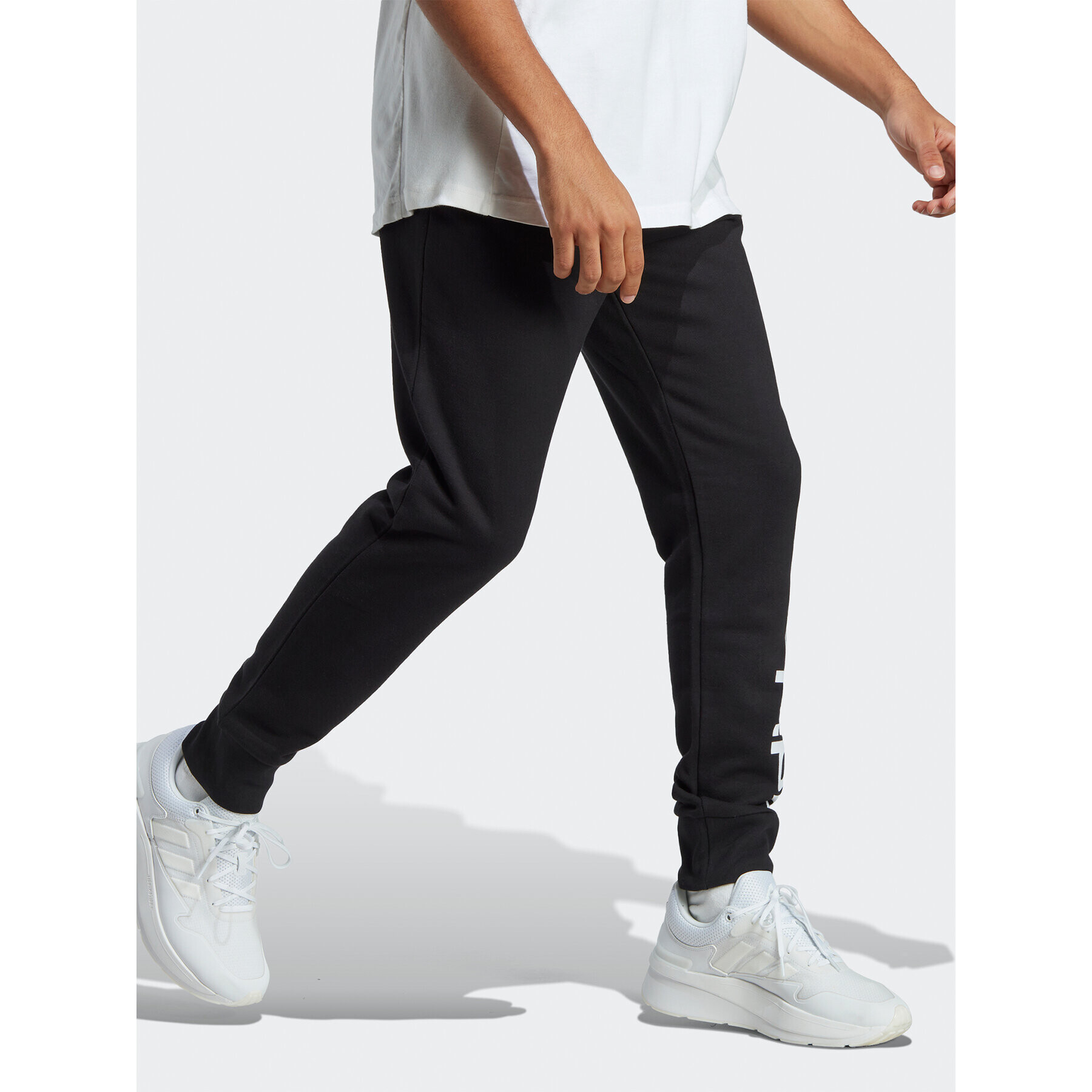 adidas Pantaloni trening Essentials French Terry Tapered Cuff Logo Joggers IC0063 Negru Regular Fit - Pled.ro