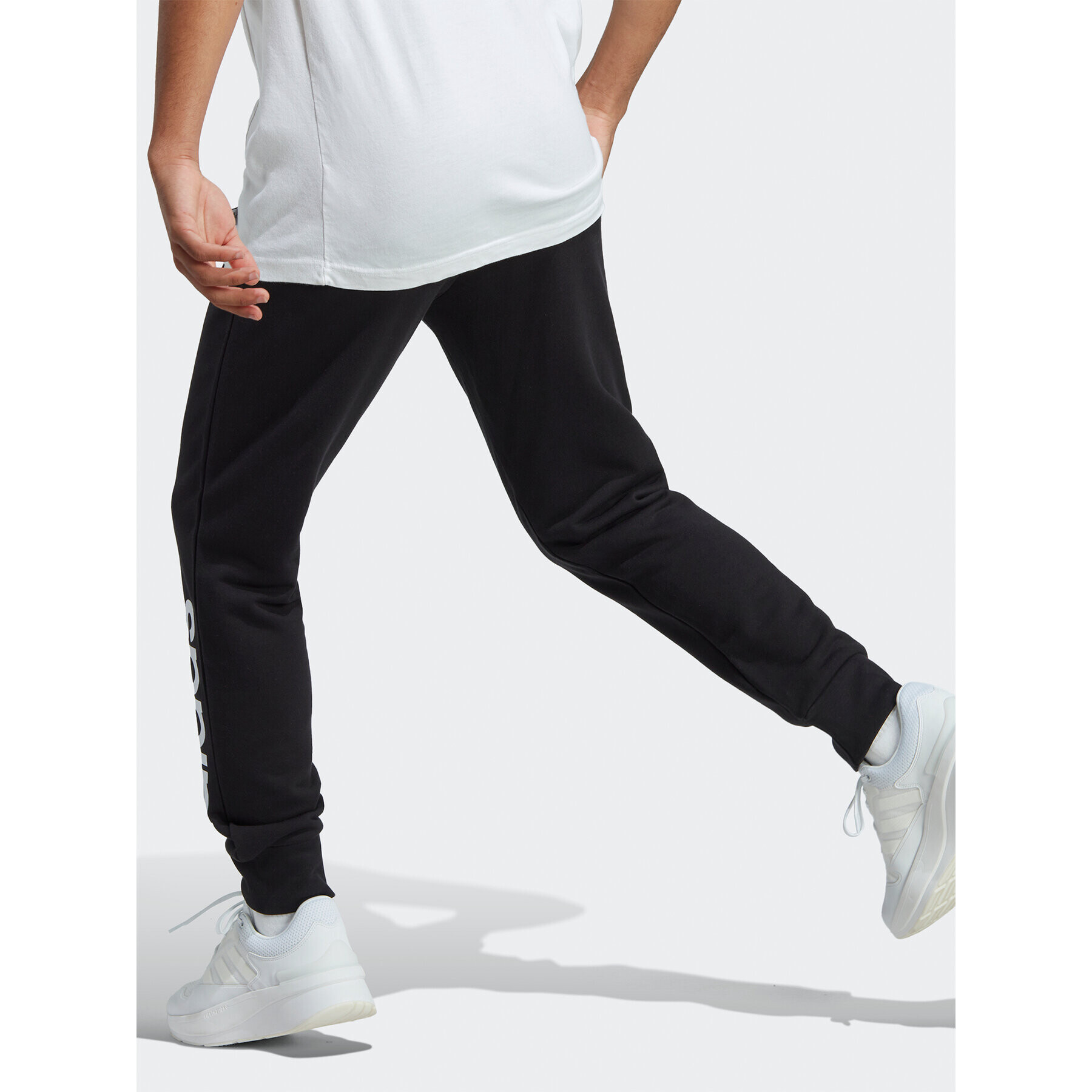 adidas Pantaloni trening Essentials French Terry Tapered Cuff Logo Joggers IC0063 Negru Regular Fit - Pled.ro