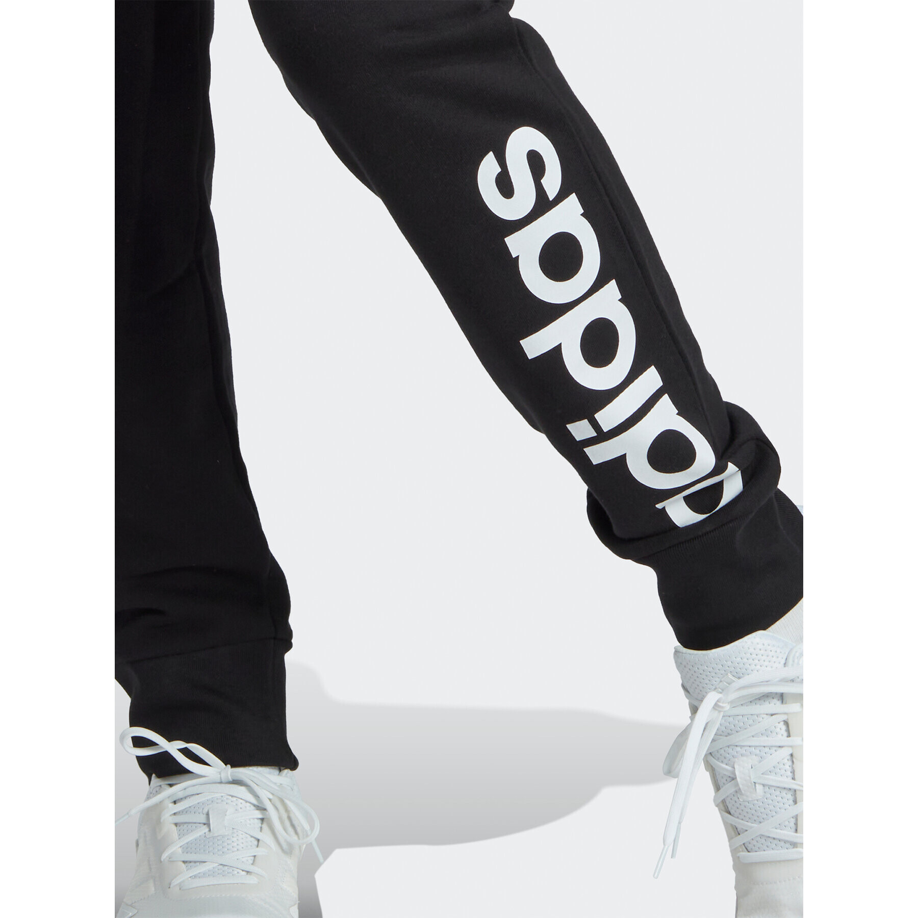 adidas Pantaloni trening Essentials French Terry Tapered Cuff Logo Joggers IC0063 Negru Regular Fit - Pled.ro