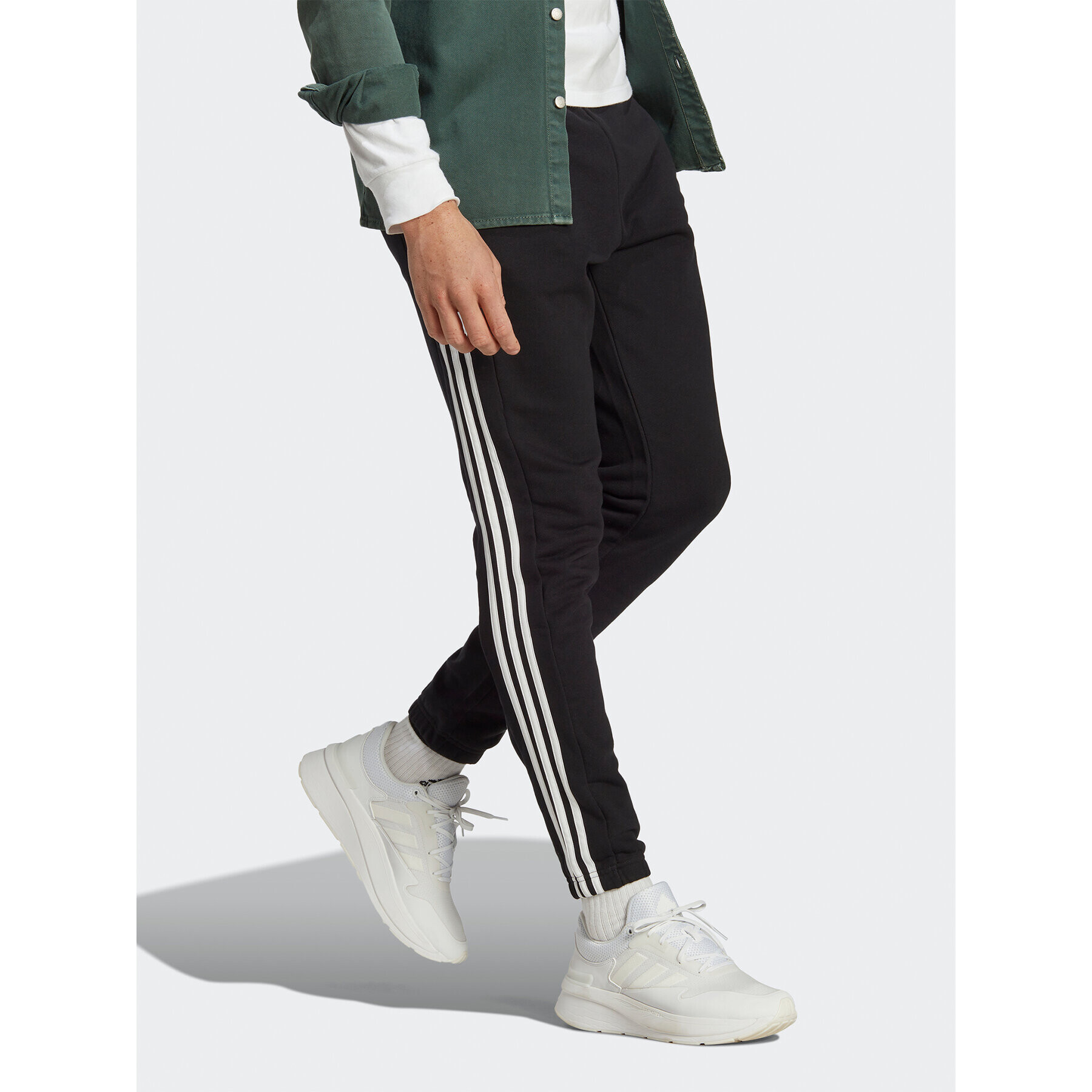 adidas Pantaloni trening Essentials French Terry Tapered Elastic Cuff 3-Stripes Joggers IC0050 Negru Regular Fit - Pled.ro