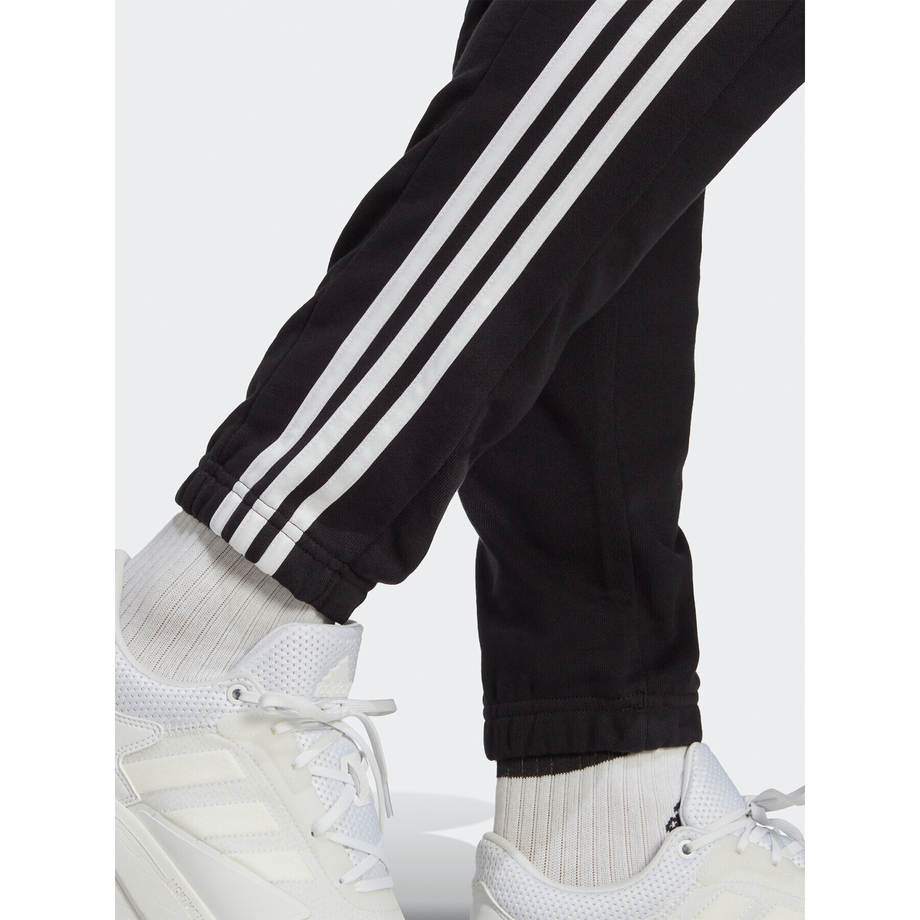 adidas Pantaloni trening Essentials French Terry Tapered Elastic Cuff 3-Stripes Joggers IC0050 Negru Regular Fit - Pled.ro