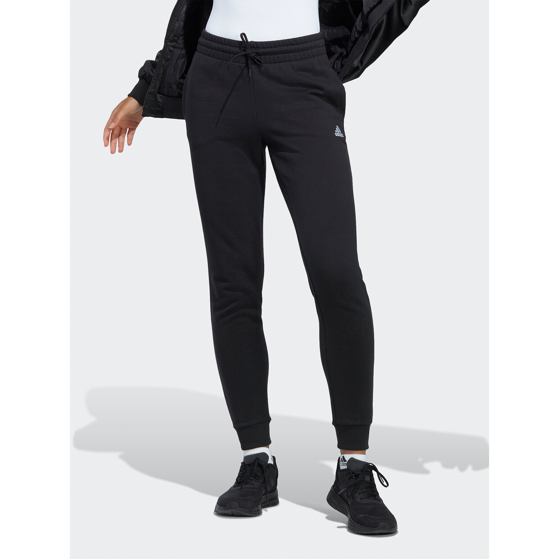 adidas Pantaloni trening Essentials Linear French Terry Cuffed Joggers IC6868 Negru Slim Fit - Pled.ro