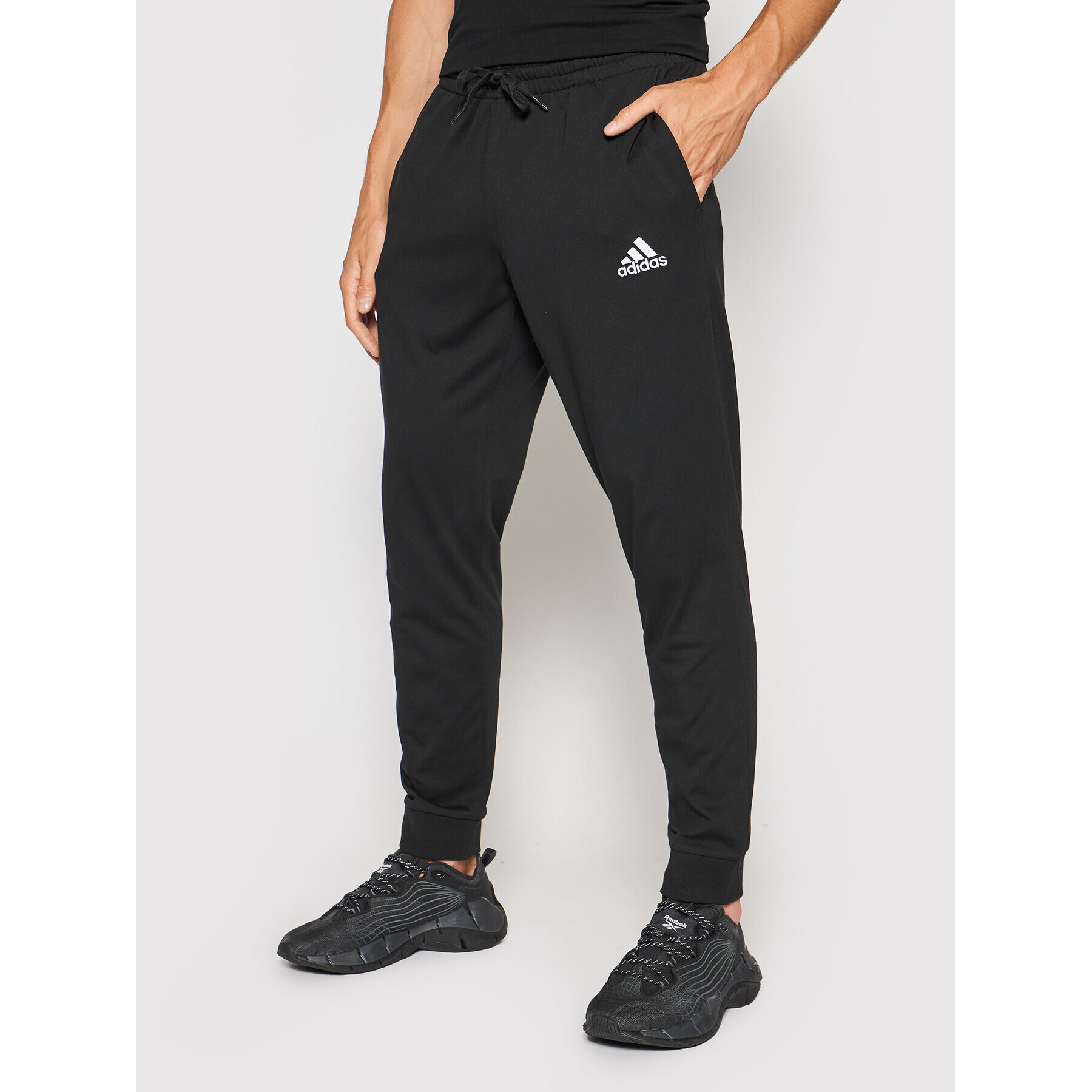 adidas Pantaloni trening Essentials Single GK9226 Negru Regular Fit - Pled.ro