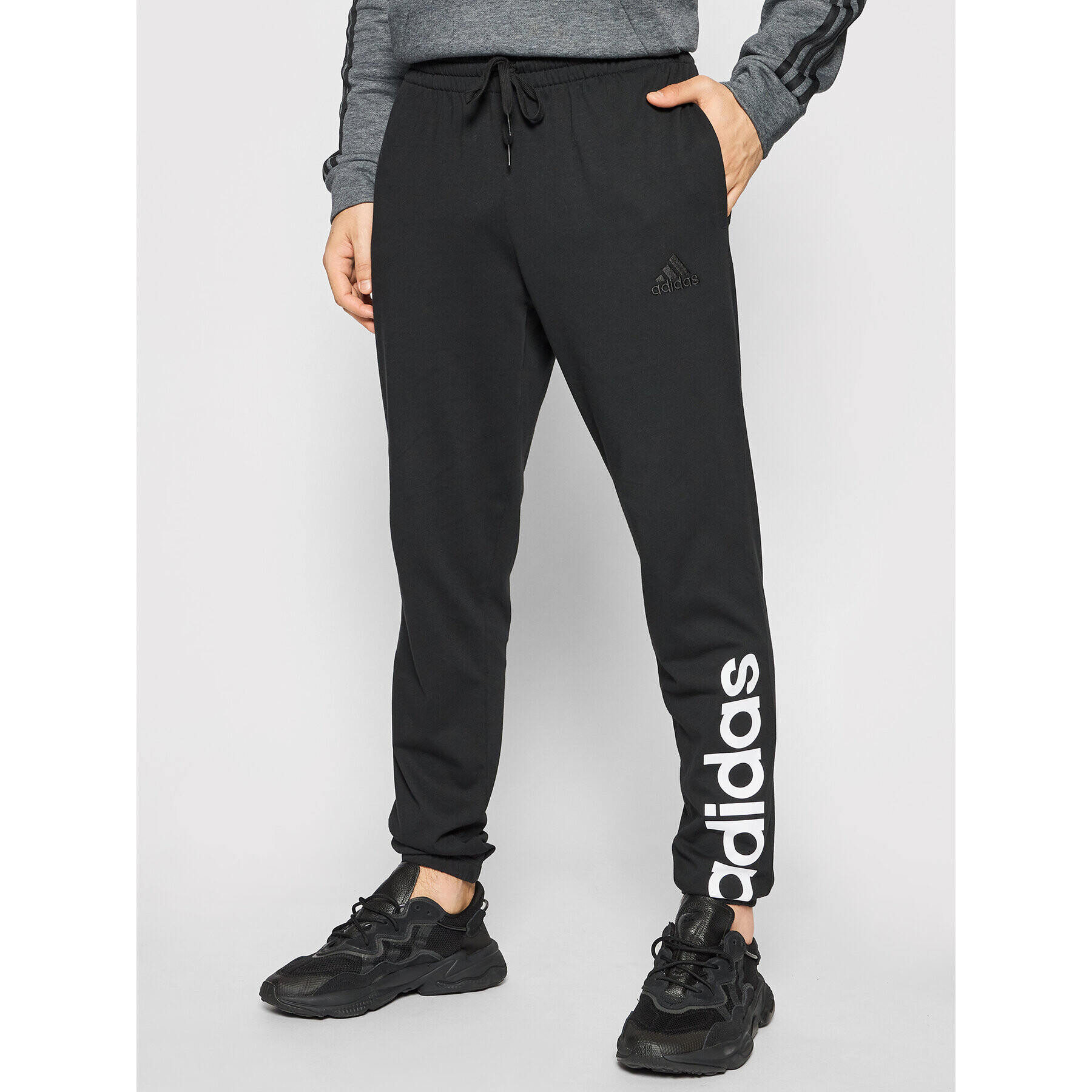 adidas Pantaloni trening Essentials Single Jersey GK8827 Negru Regular Fit - Pled.ro