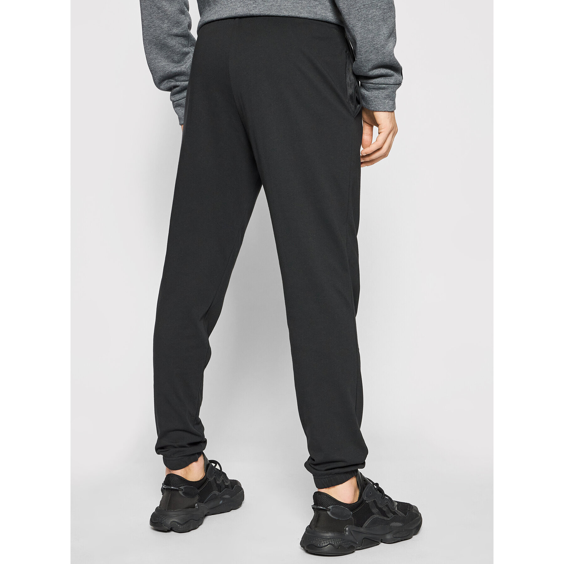 adidas Pantaloni trening Essentials Single Jersey GK8827 Negru Regular Fit - Pled.ro