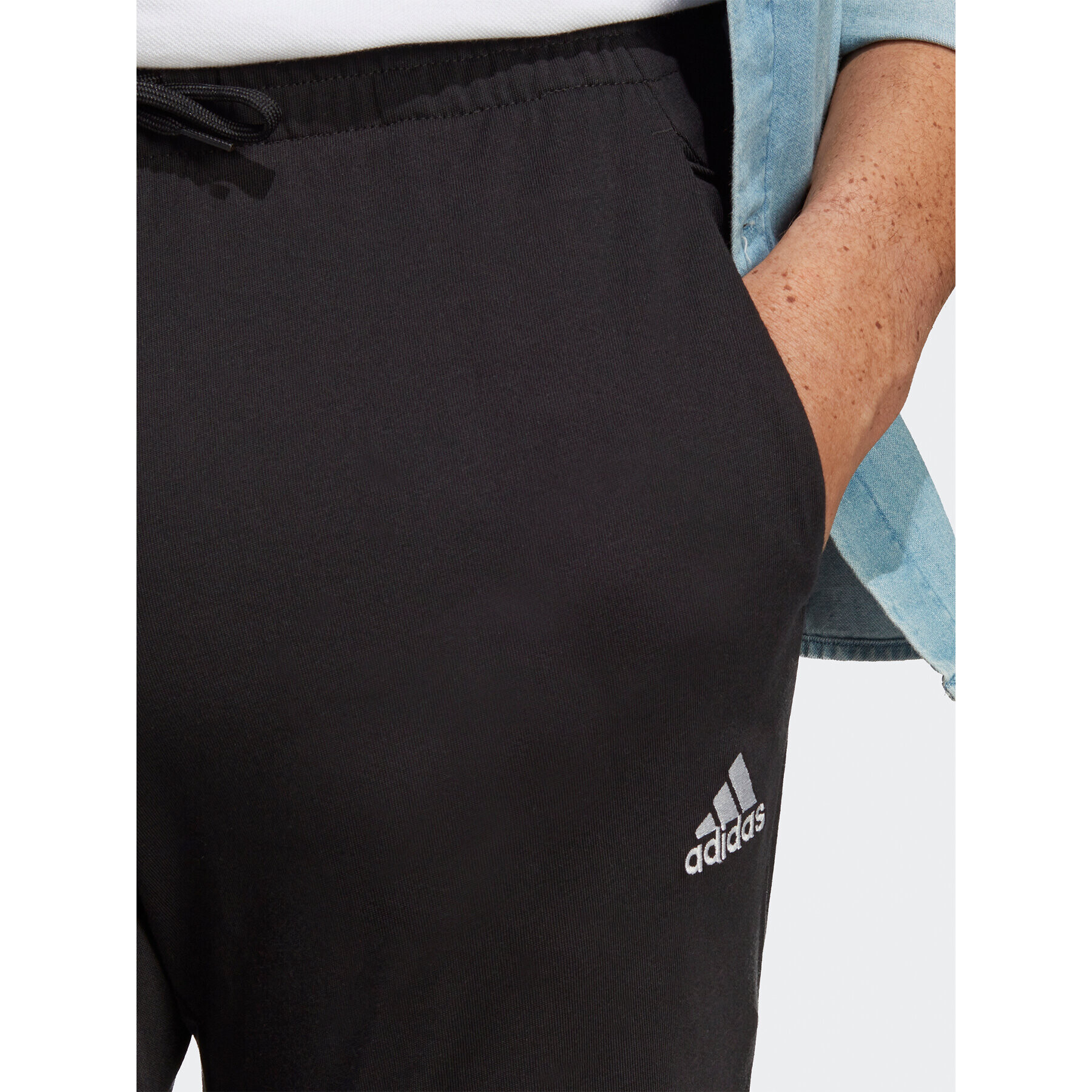 adidas Pantaloni trening Essentials Single Jersey Tapered Elasticized Cuff Logo Joggers IC0055 Negru Regular Fit - Pled.ro