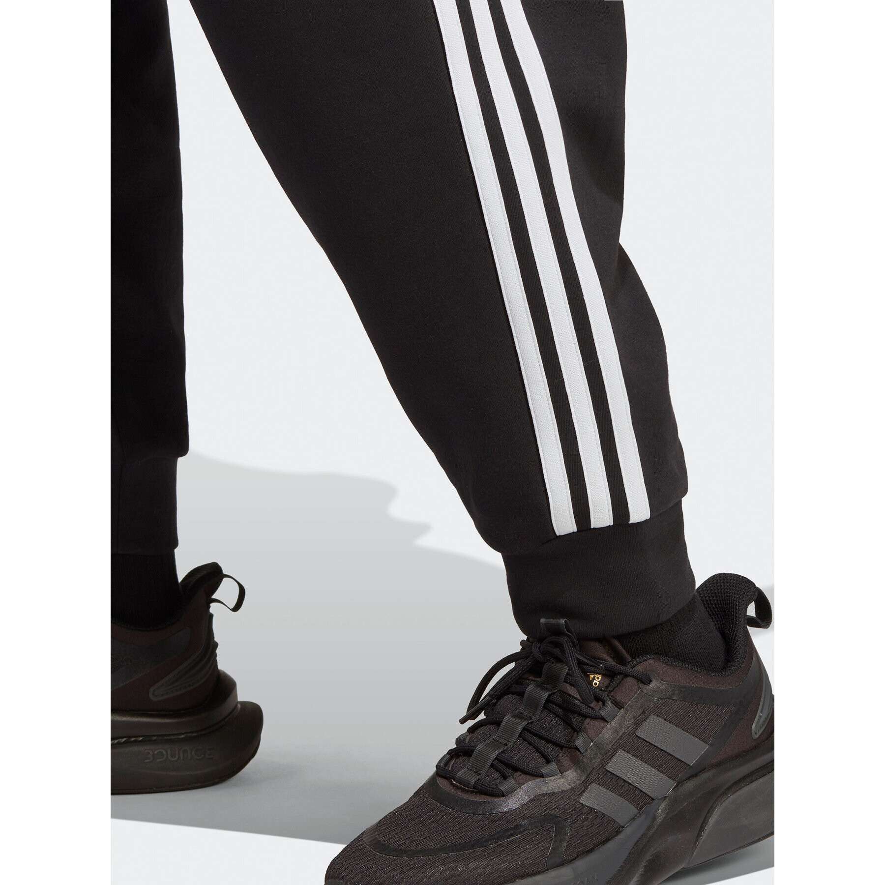 adidas Pantaloni trening Future Icons 3-Stripes Regular Tracksuit Bottoms (Plus Size) HT4703 Negru Regular Fit - Pled.ro