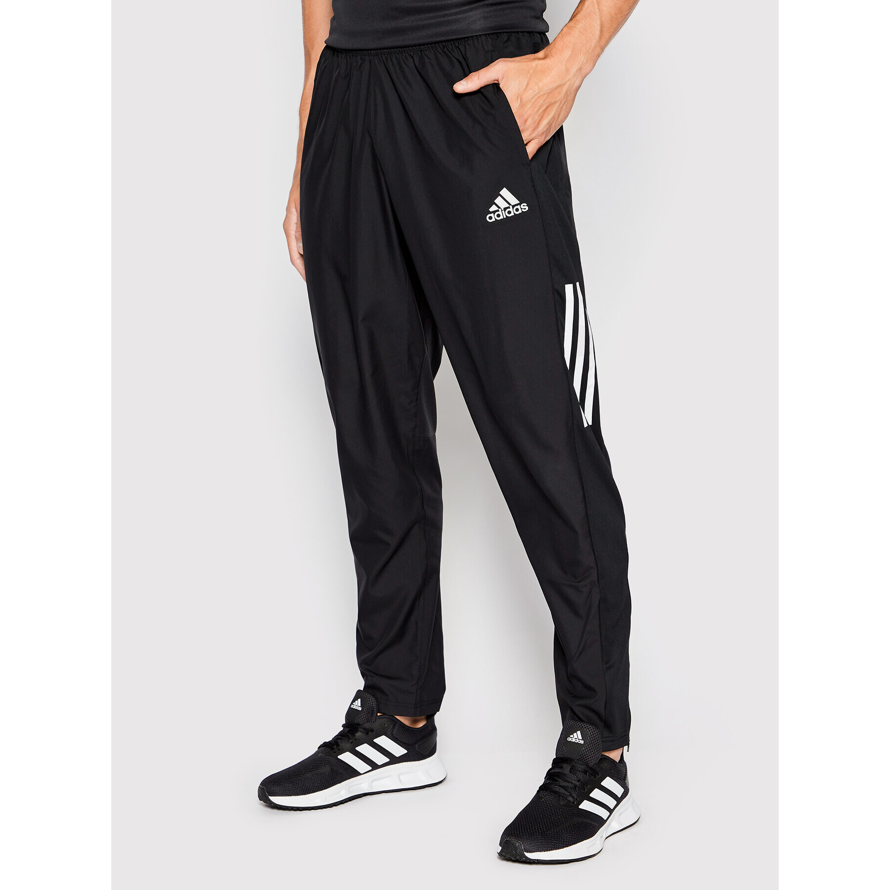 adidas Pantaloni trening Own The Run Astro Wind H13238 Negru Regular Fit - Pled.ro