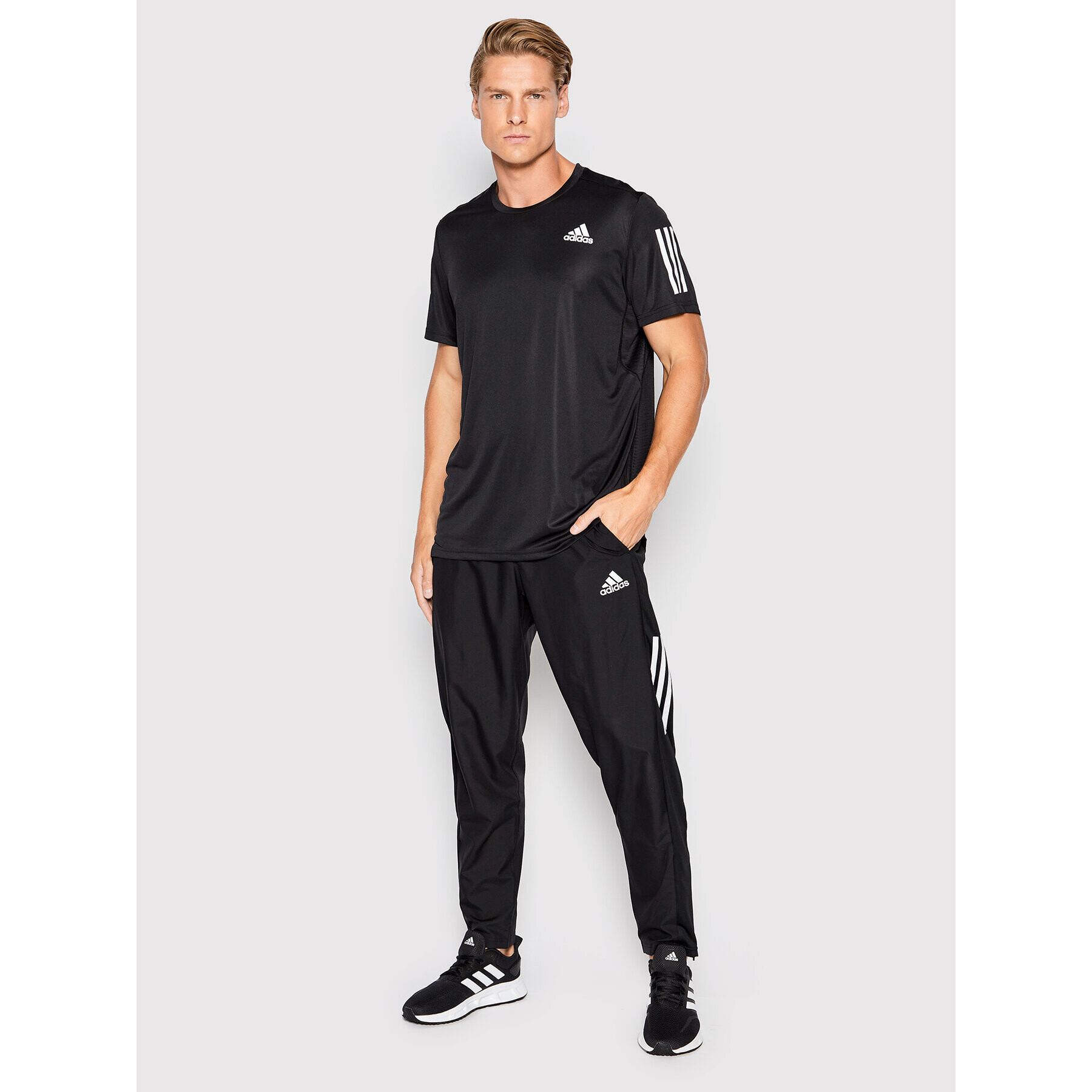 adidas Pantaloni trening Own The Run Astro Wind H13238 Negru Regular Fit - Pled.ro