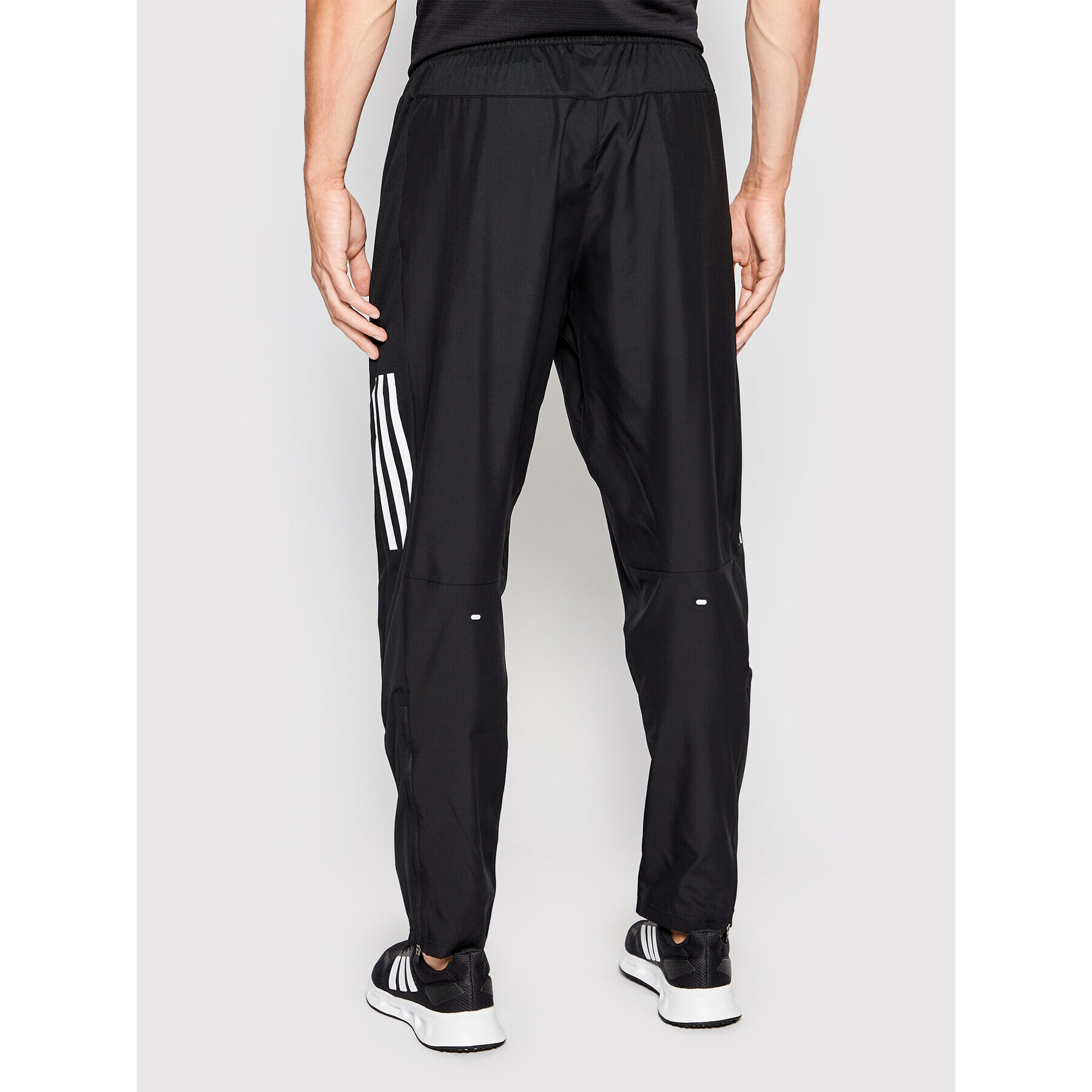 adidas Pantaloni trening Own The Run Astro Wind H13238 Negru Regular Fit - Pled.ro