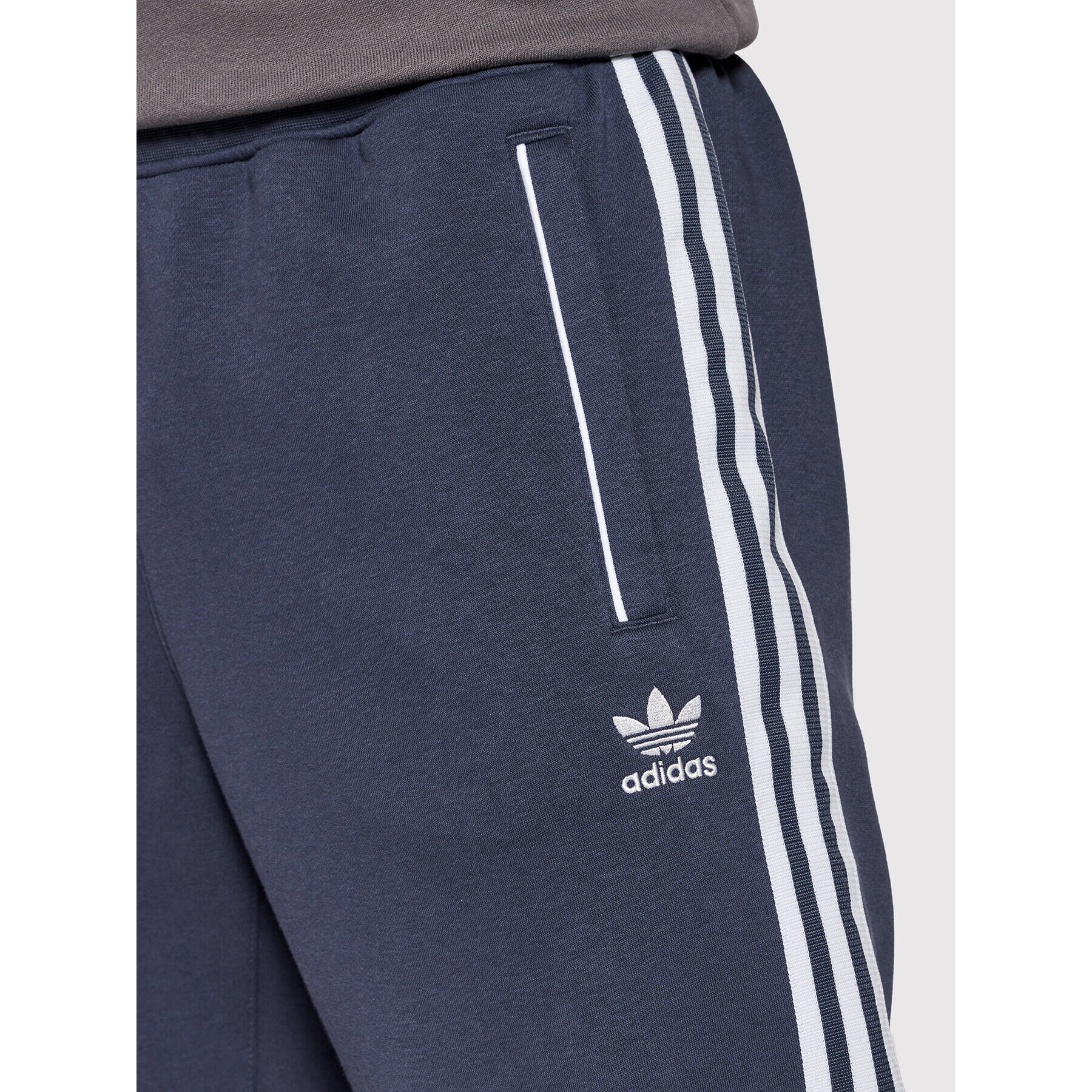 adidas Pantaloni trening Sst Fleece Track HC2083 Bleumarin Regular Fit - Pled.ro