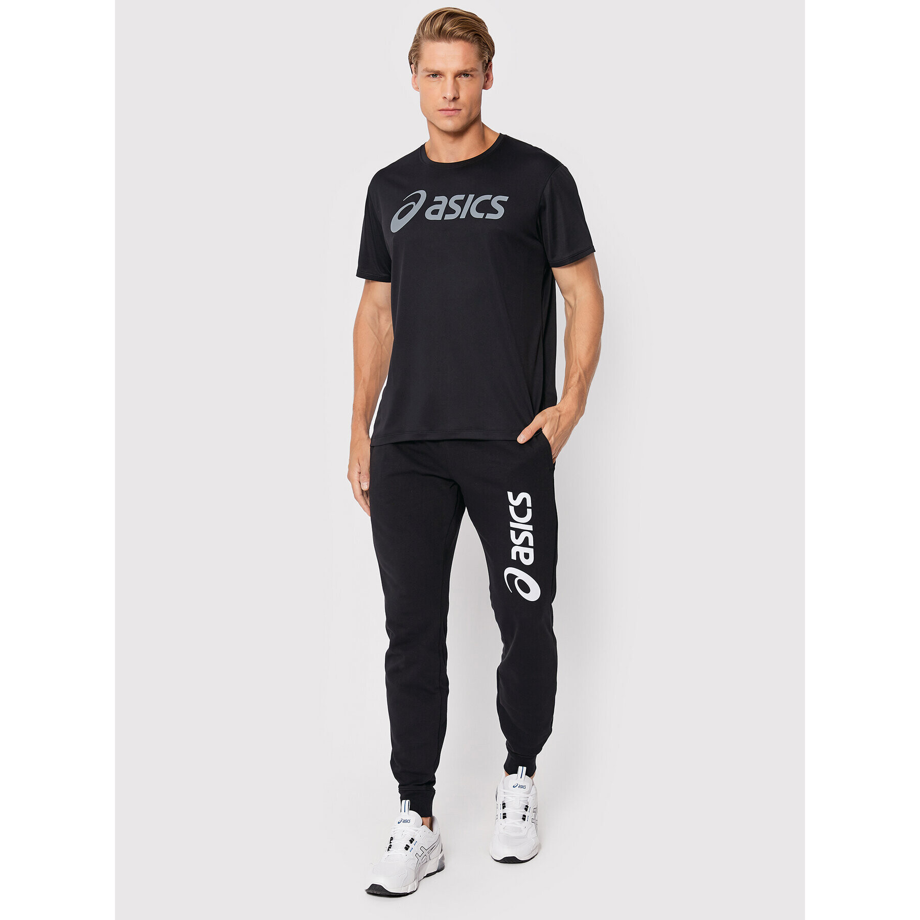 Asics Pantaloni trening Big Logo 2031A977 Negru Slim Fit - Pled.ro