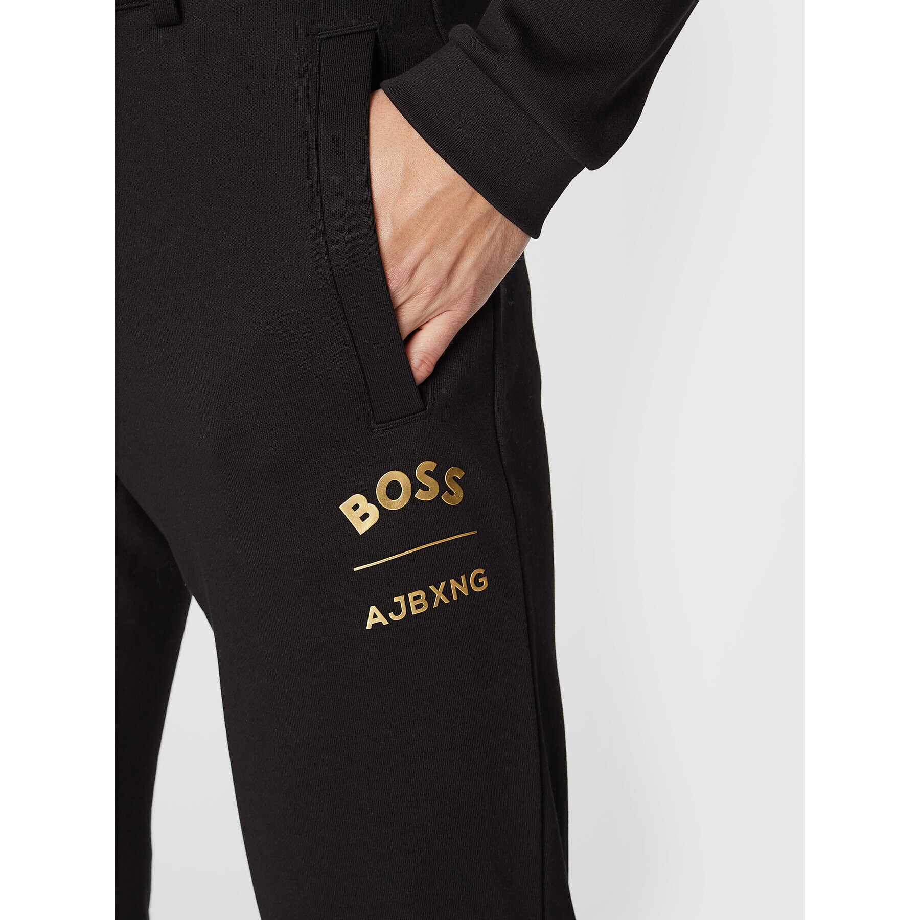 Boss Pantaloni trening AJBXNG Halboa Aj 50476434 Negru Regular Fit - Pled.ro