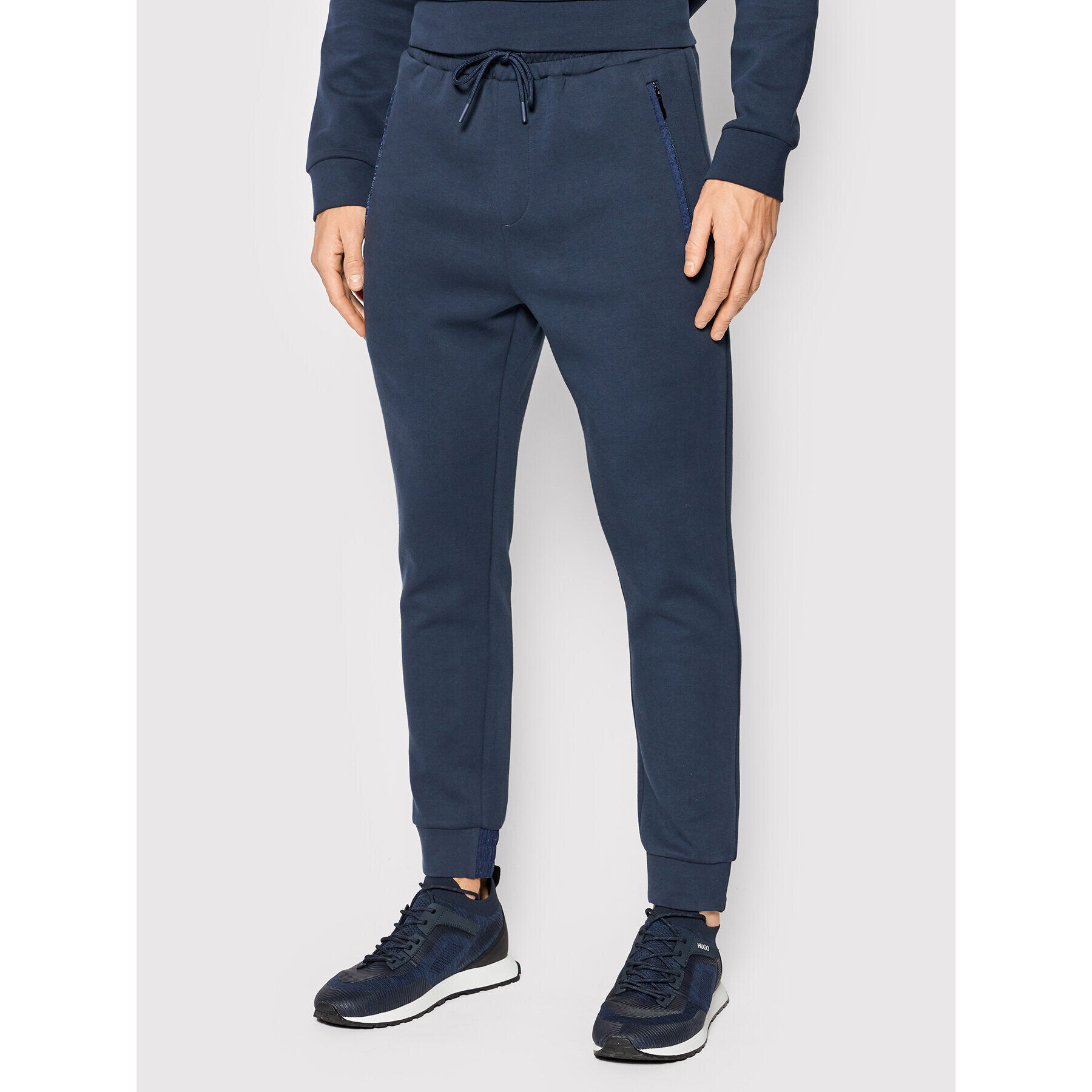 Boss Pantaloni trening Helwyn 50461976 Bleumarin Regular Fit - Pled.ro