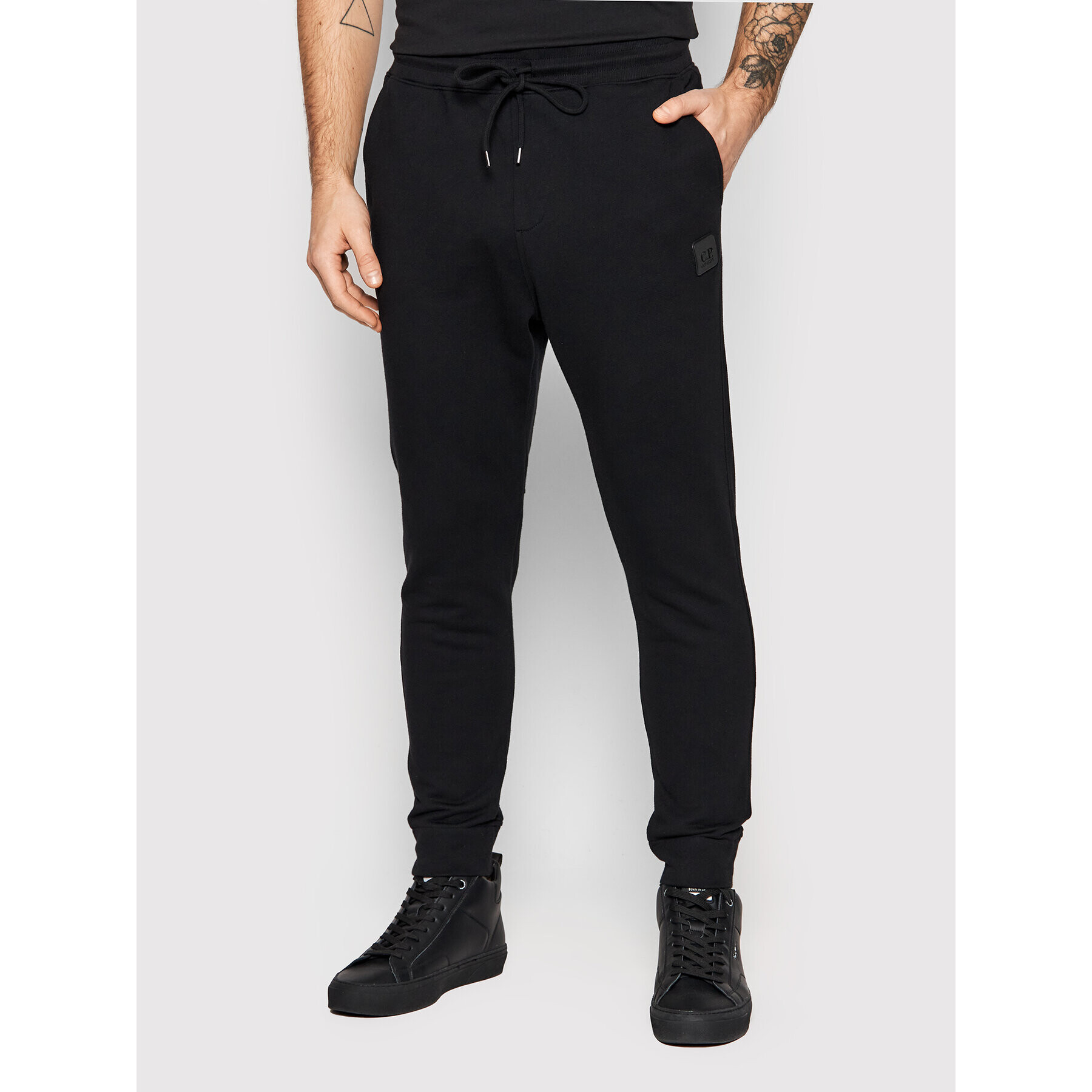 C.P. Company Pantaloni trening Diagonal Raised 12CMSP070A 005086W Negru Regular Fit - Pled.ro