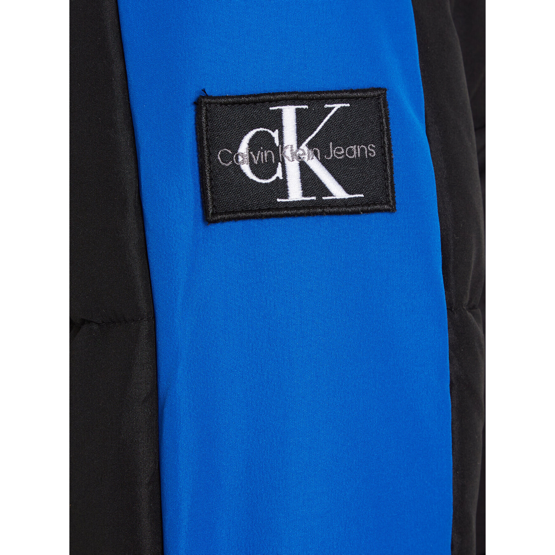 Calvin Klein Jeans Geacă din puf Color Block IB0IB01722 Negru Regular Fit - Pled.ro