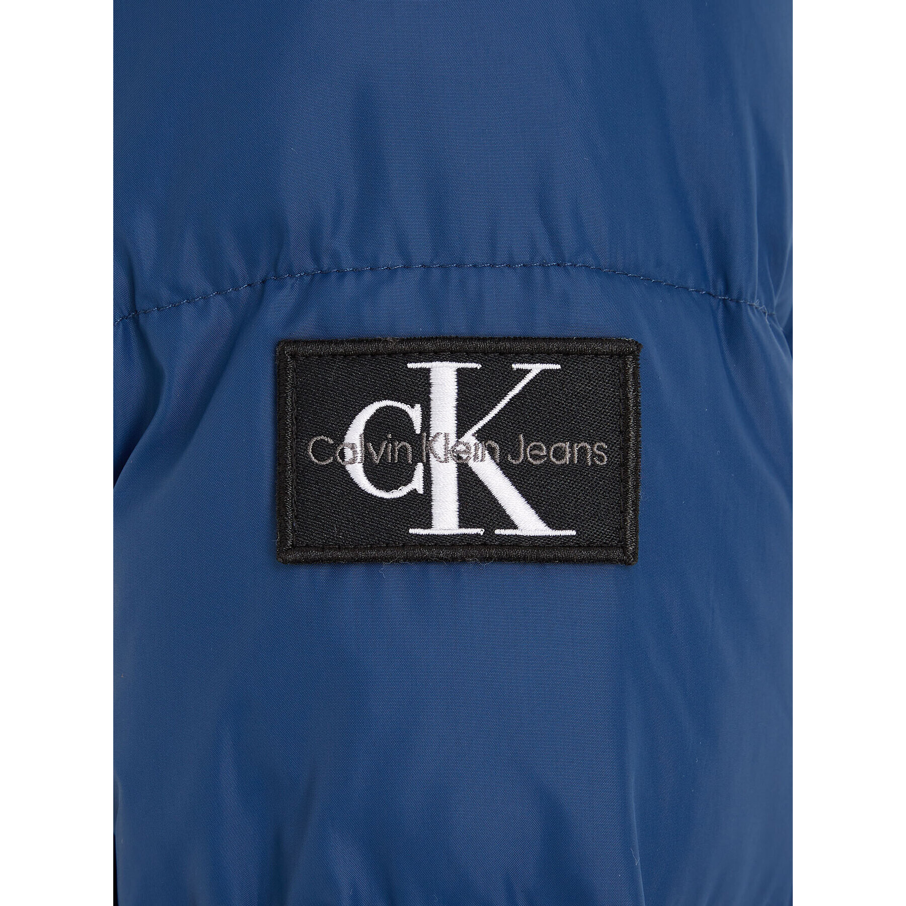 Calvin Klein Jeans Geacă din puf Essential IB0IB01276 Bleumarin Regular Fit - Pled.ro