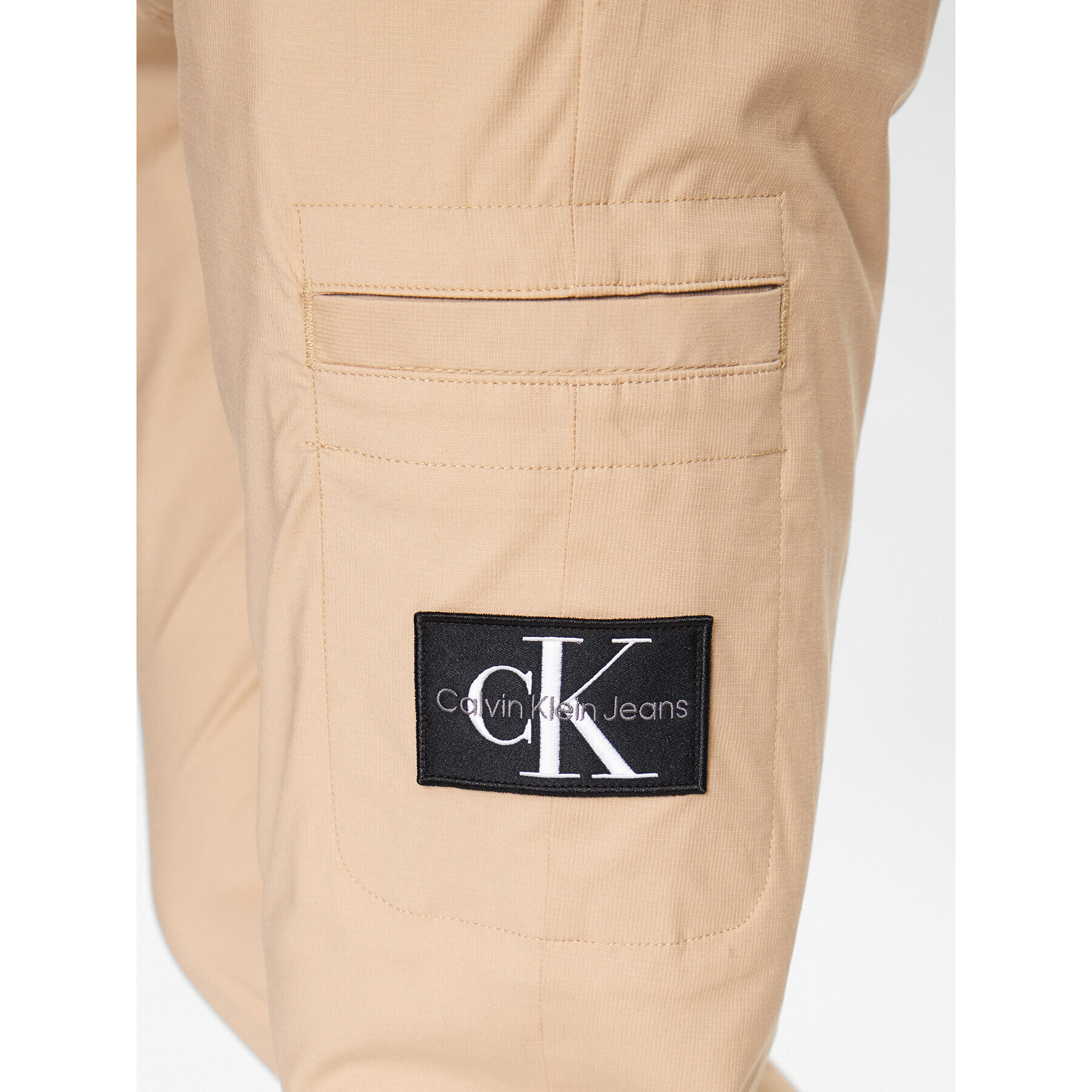 Calvin Klein Jeans Pantaloni din material J30J323508 Bej Regular Fit - Pled.ro