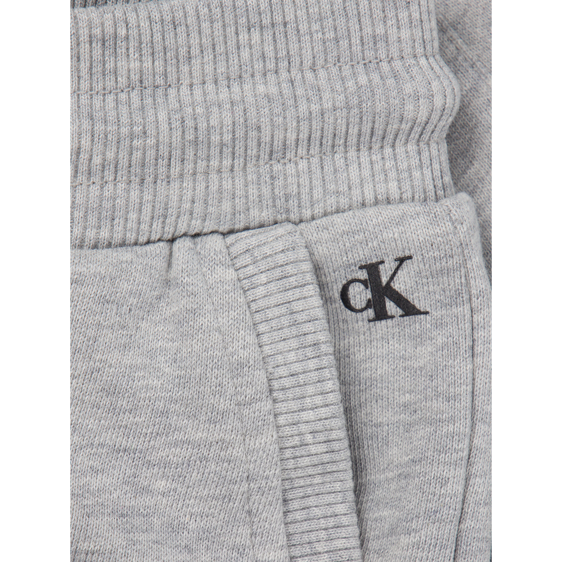 Calvin Klein Jeans Pantaloni trening Stamp Logo IB0IB00344 Gri Regular Fit - Pled.ro