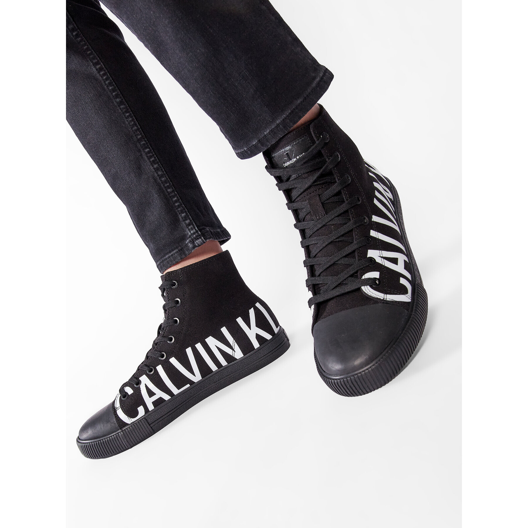 Calvin Klein Jeans Teniși Vulcanized Mid Sneaker Logo YM0YM00276 Negru - Pled.ro