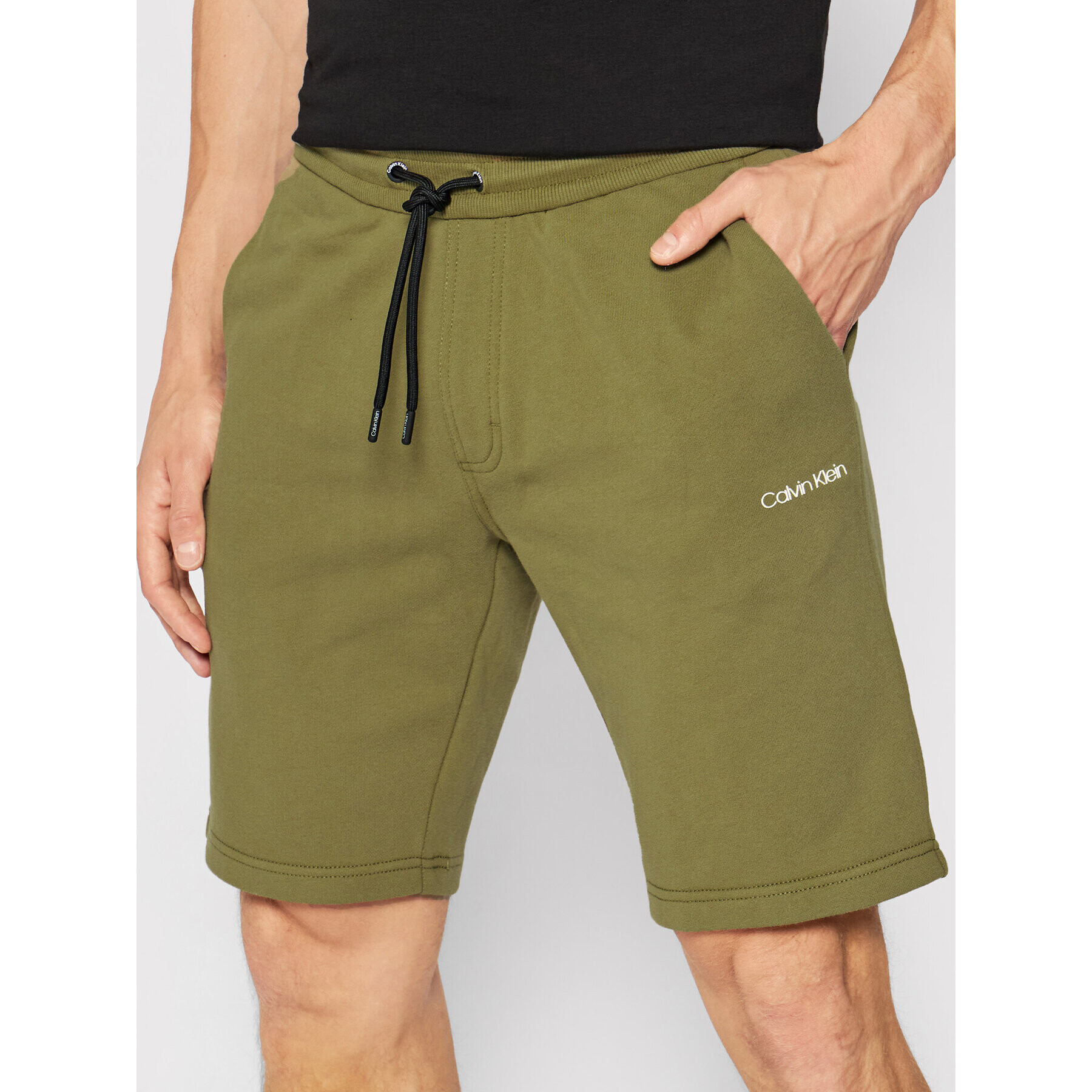 Calvin Klein Pantaloni scurți sport Logo K10K107142 Verde Regular Fit - Pled.ro