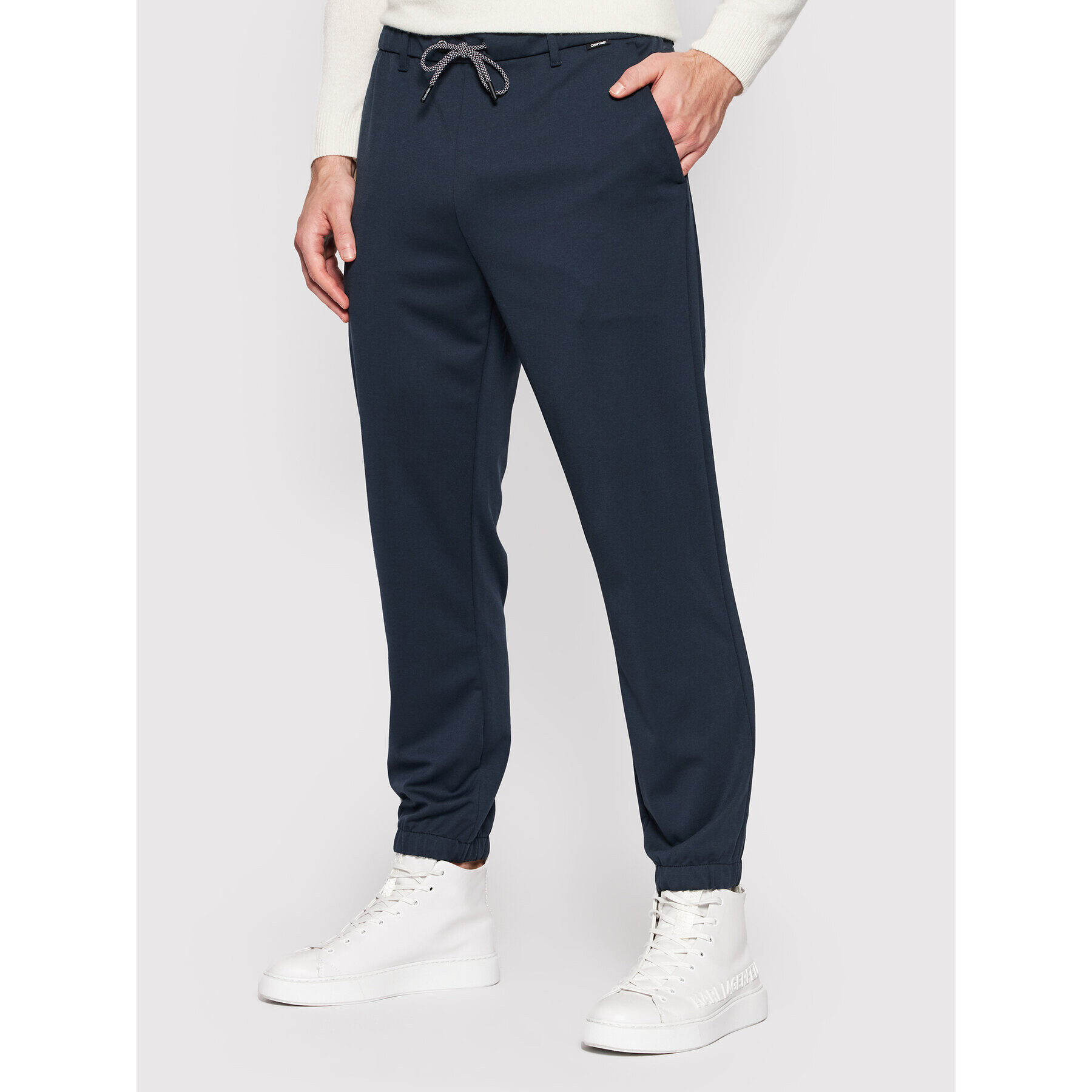 Calvin Klein Pantaloni trening Comfort K10K107498 Bleumarin Tapered Fit - Pled.ro