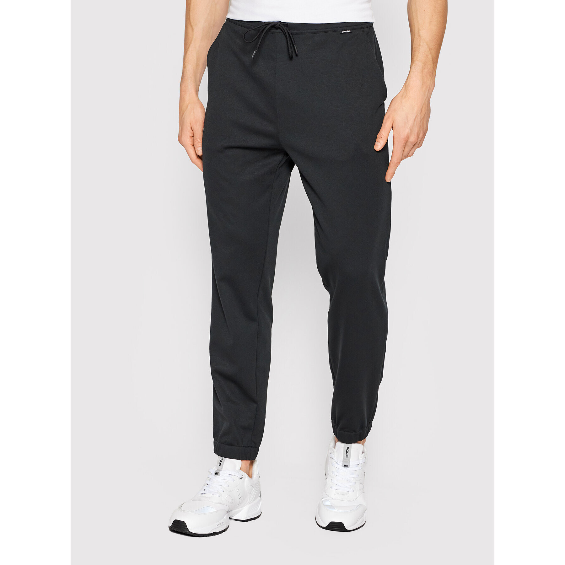 Calvin Klein Pantaloni trening K10K108646 Negru Slim Fit - Pled.ro