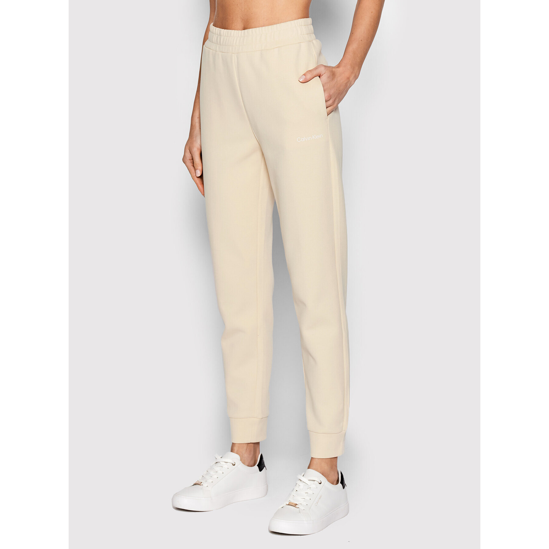 Calvin Klein Pantaloni trening K20K204424 Bej Regular Fit - Pled.ro