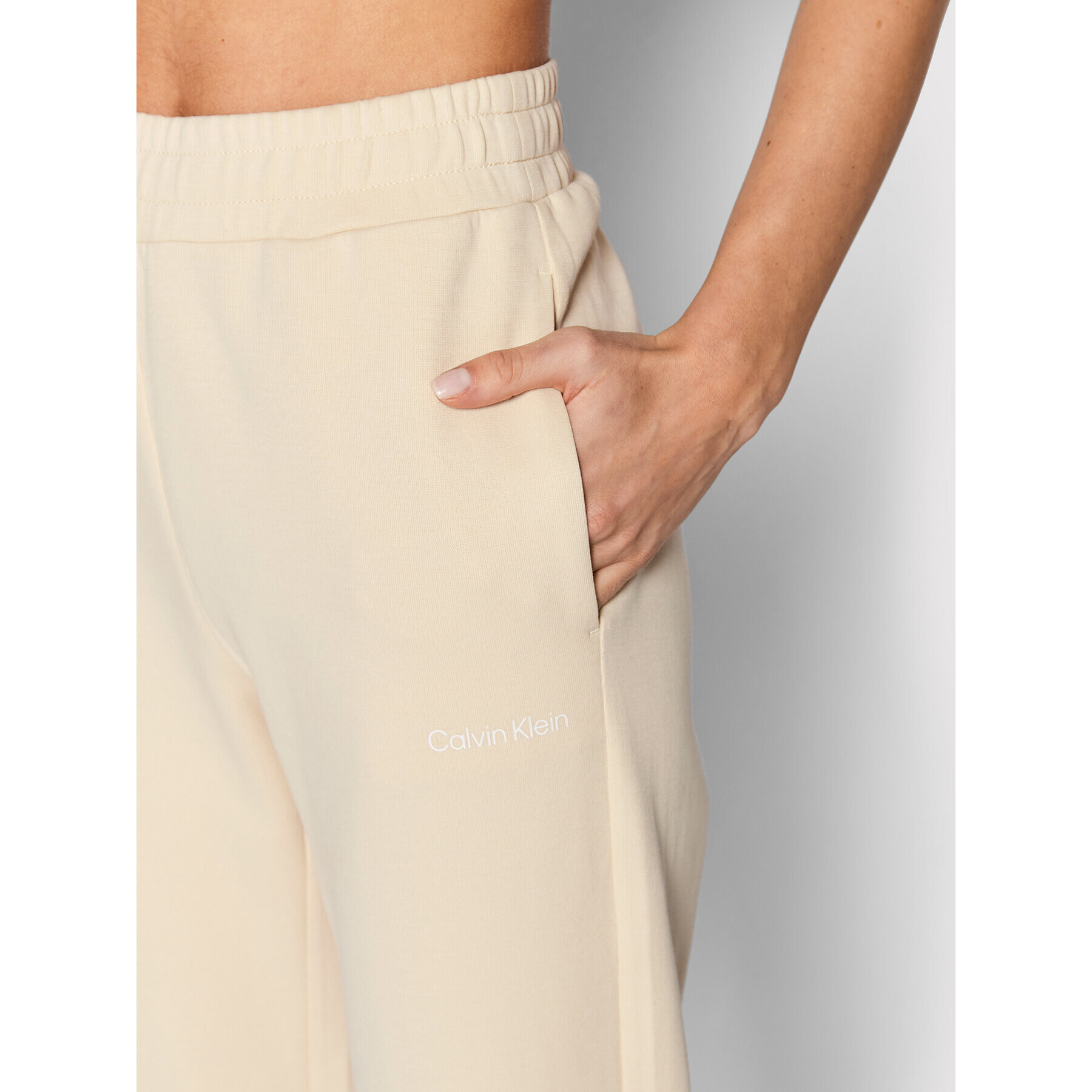 Calvin Klein Pantaloni trening K20K204424 Bej Regular Fit - Pled.ro