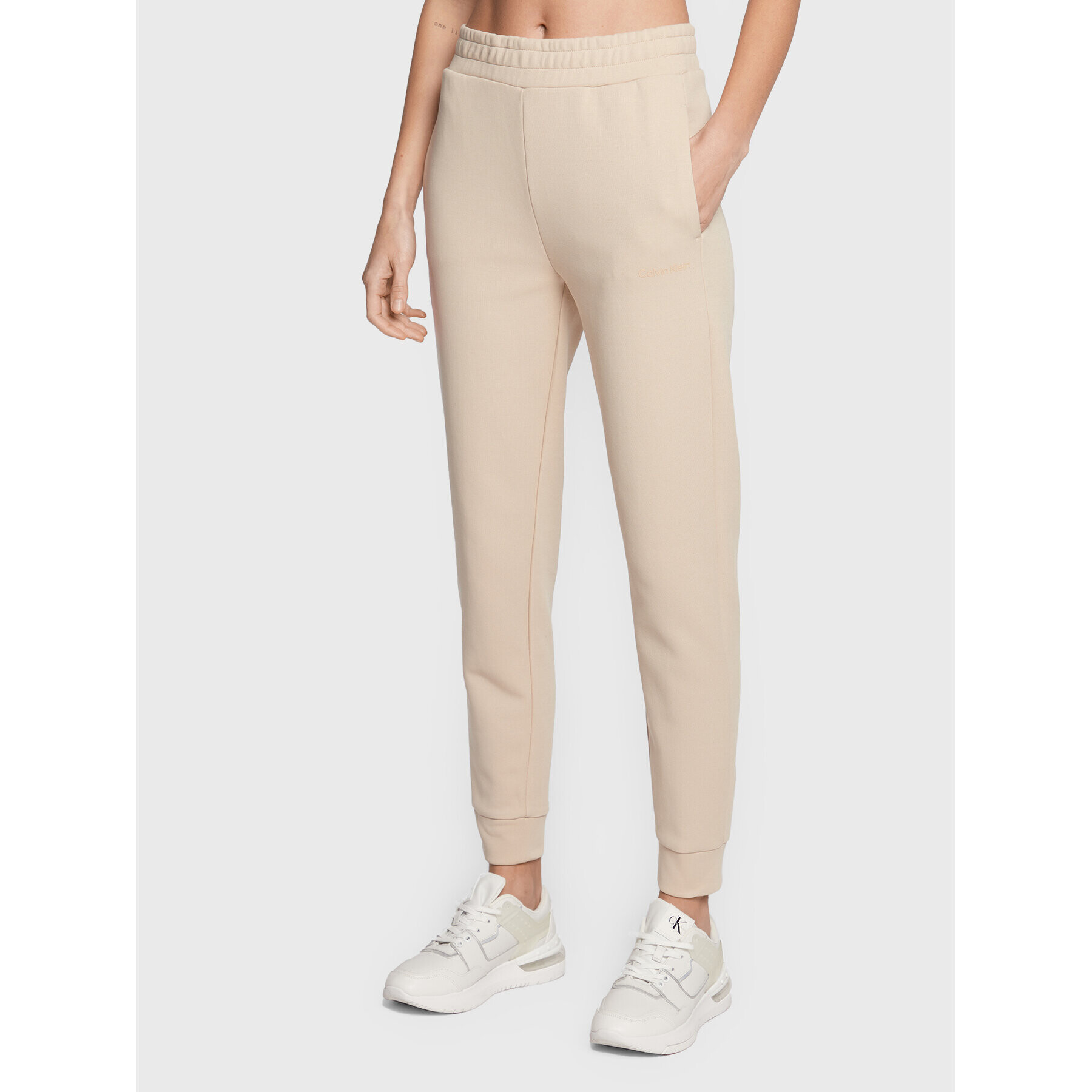 Calvin Klein Pantaloni trening Micro Logo Essential K20K204424 Bej Regular Fit - Pled.ro